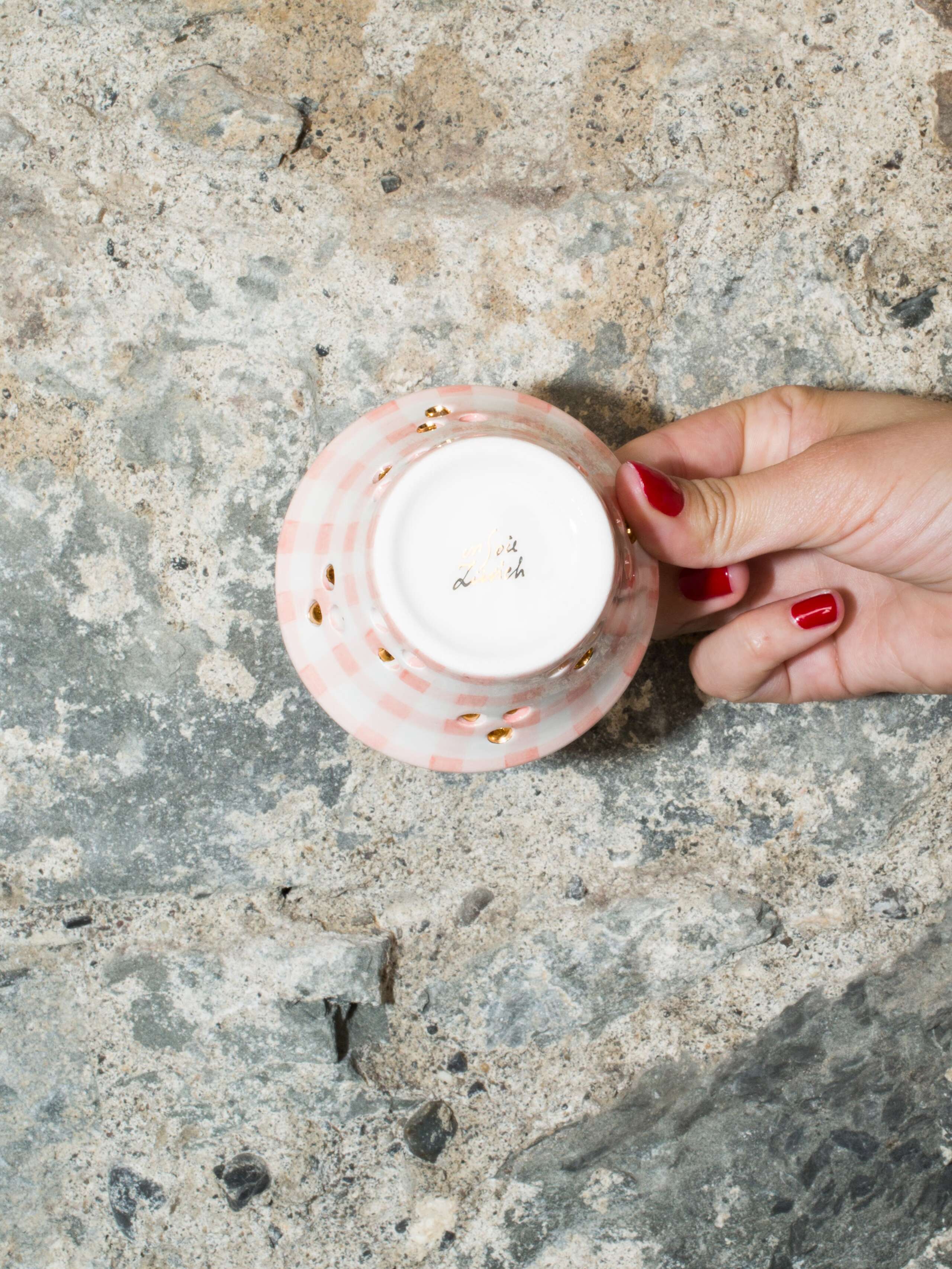 person holding tealight