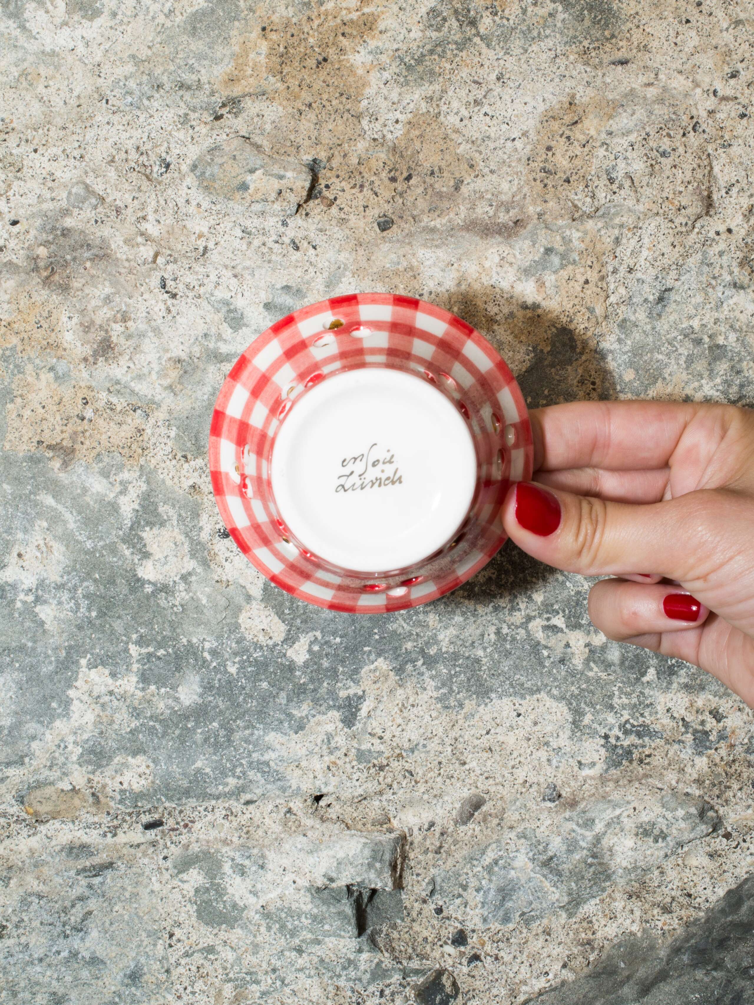 person holding tealight