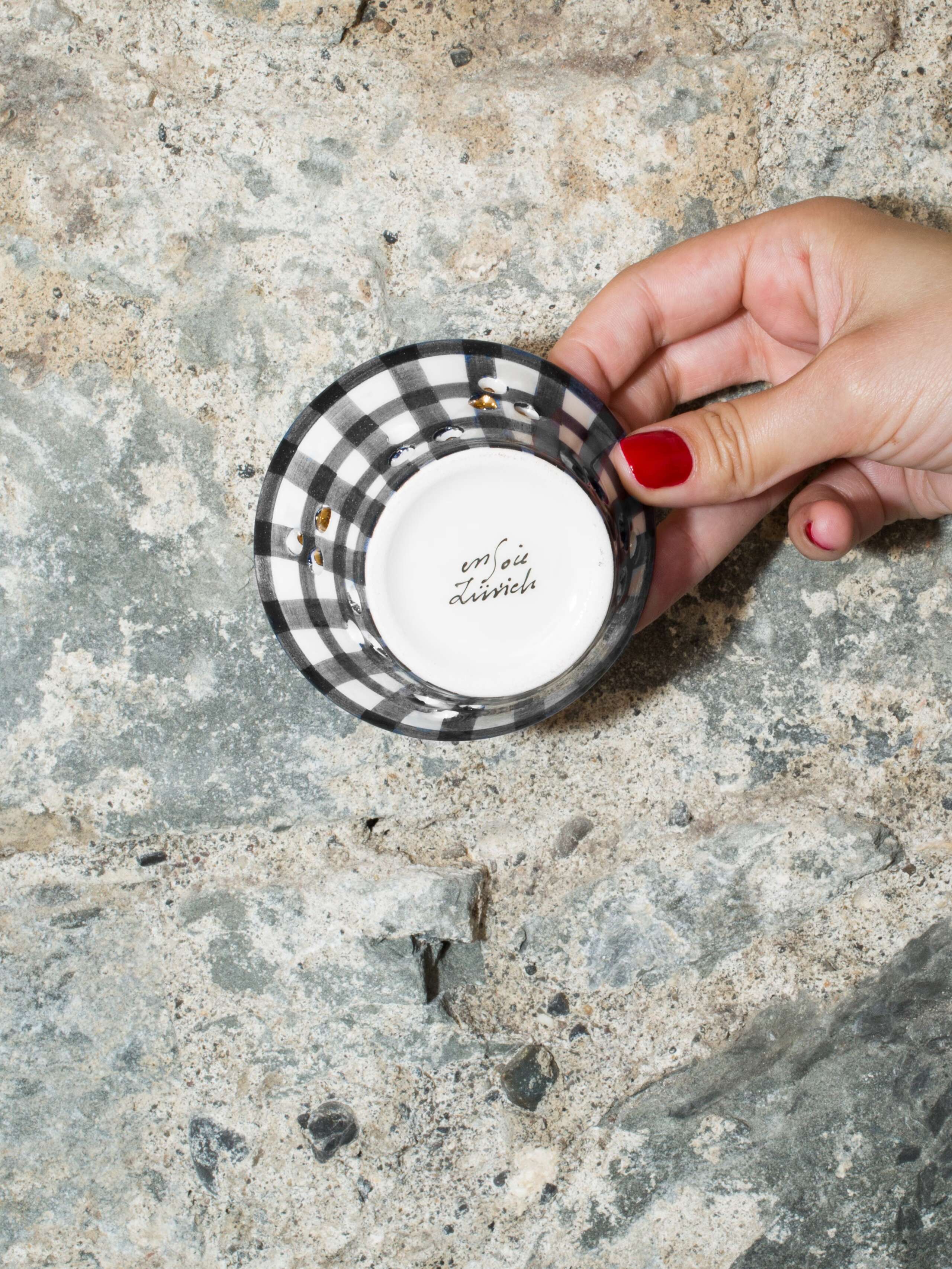 person holding tea light 