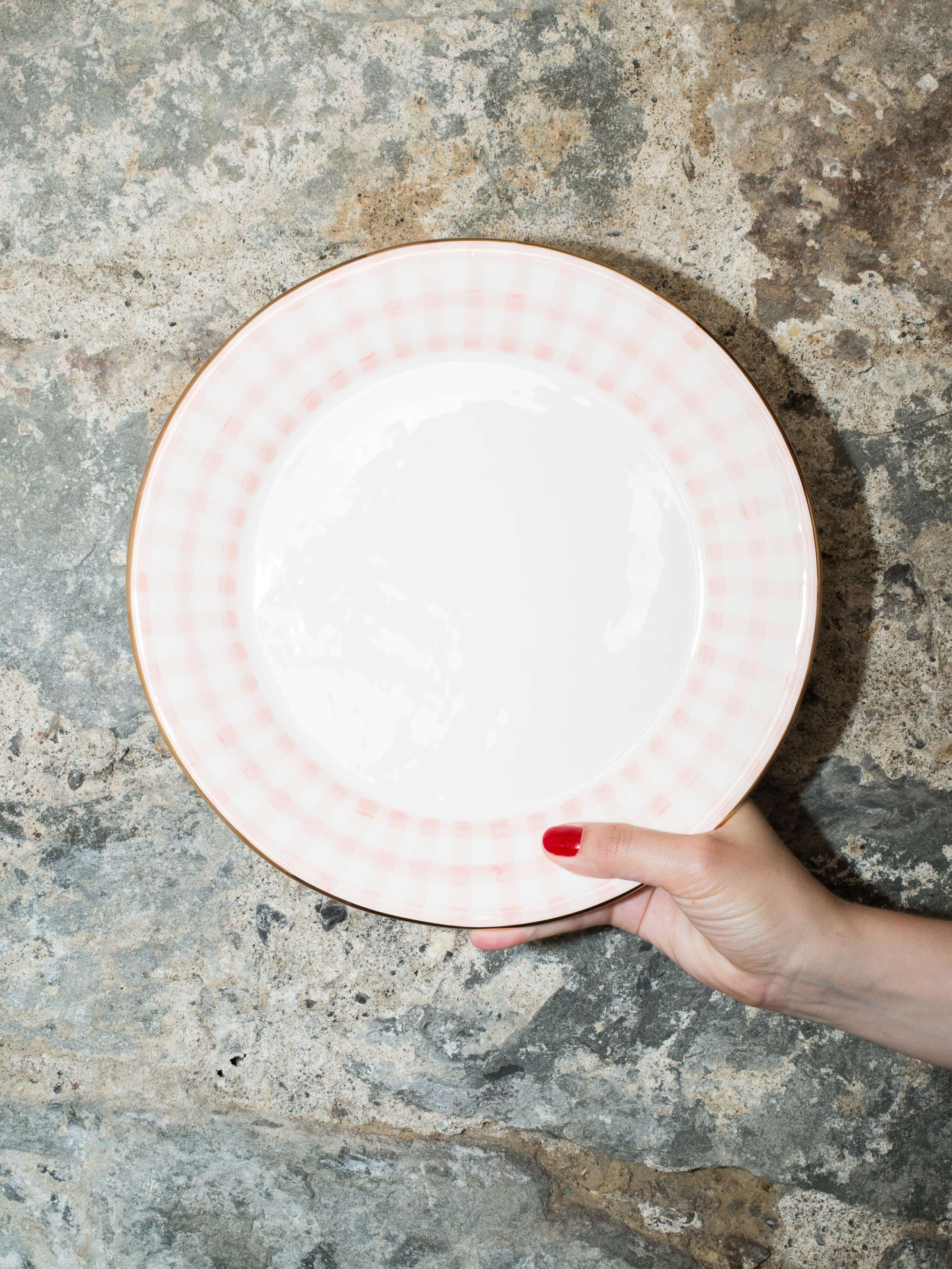 person holding plate 