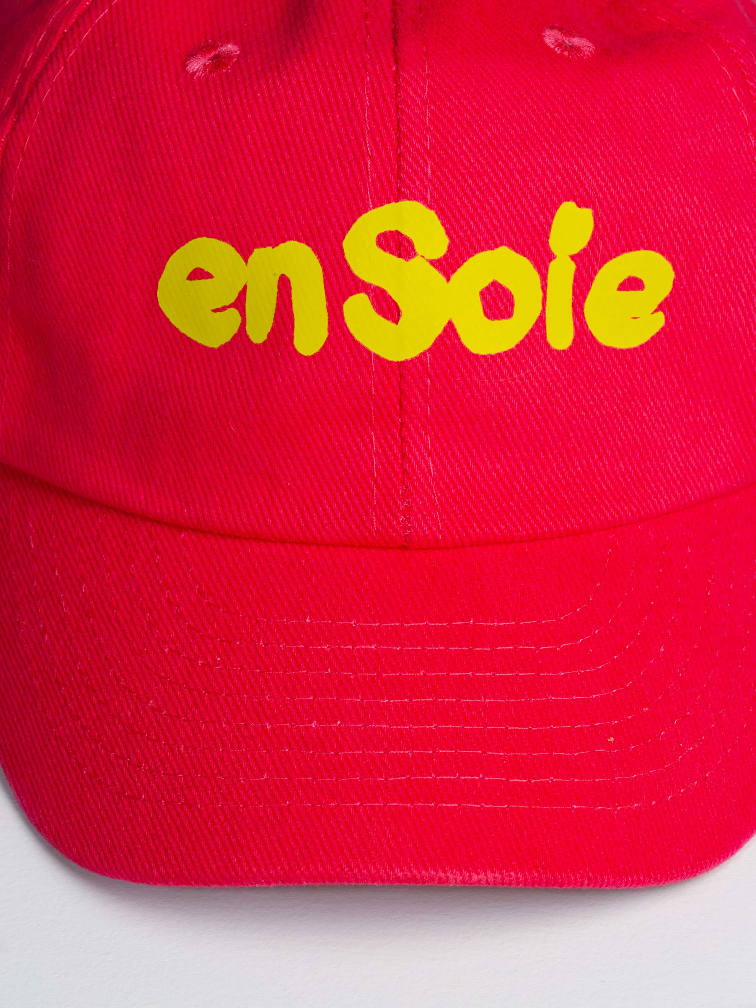 red Tommy cap
