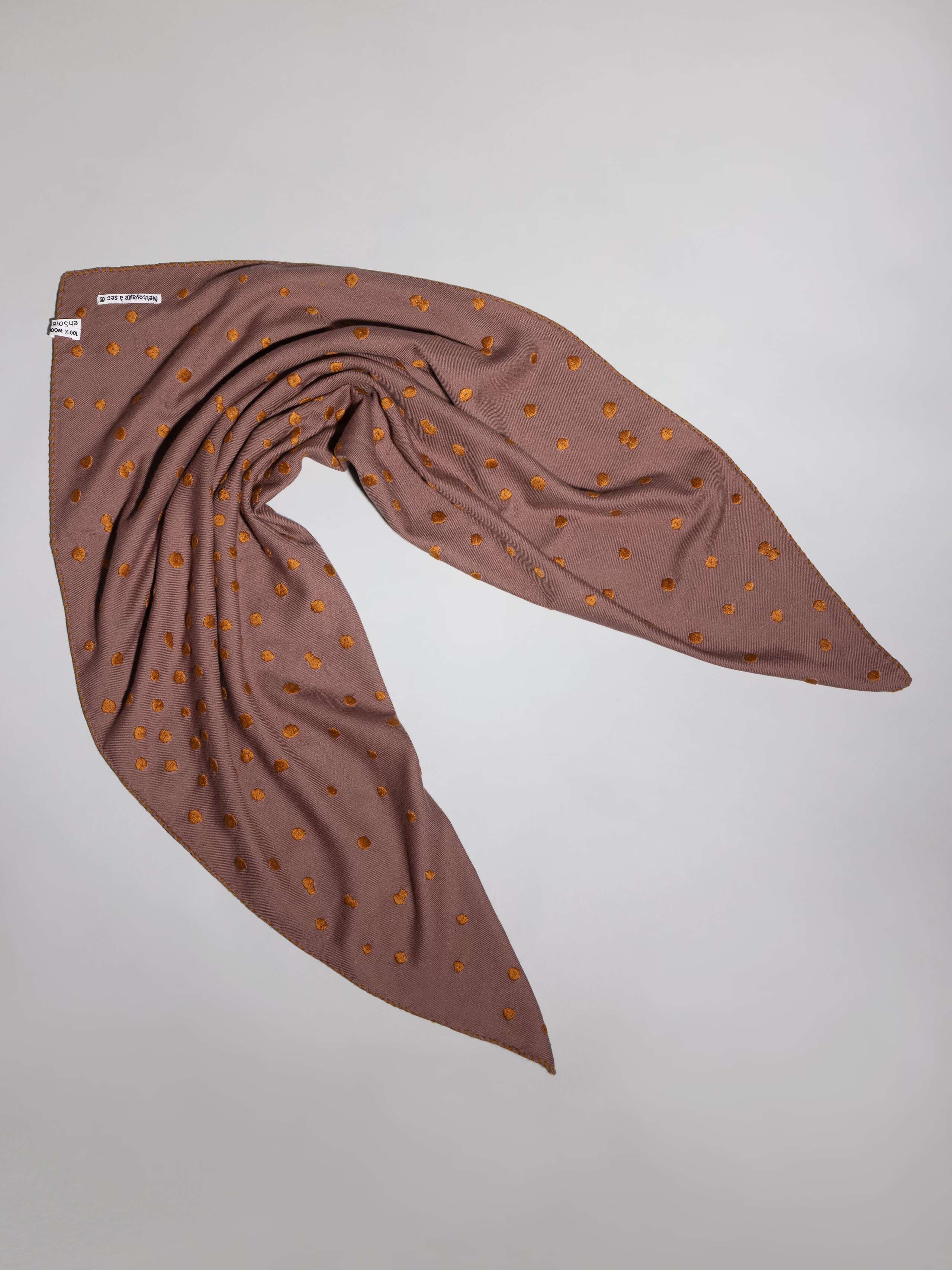 folded eo wool scarf in a warm cherry wood purple with dot embroidery in warm bronze shades