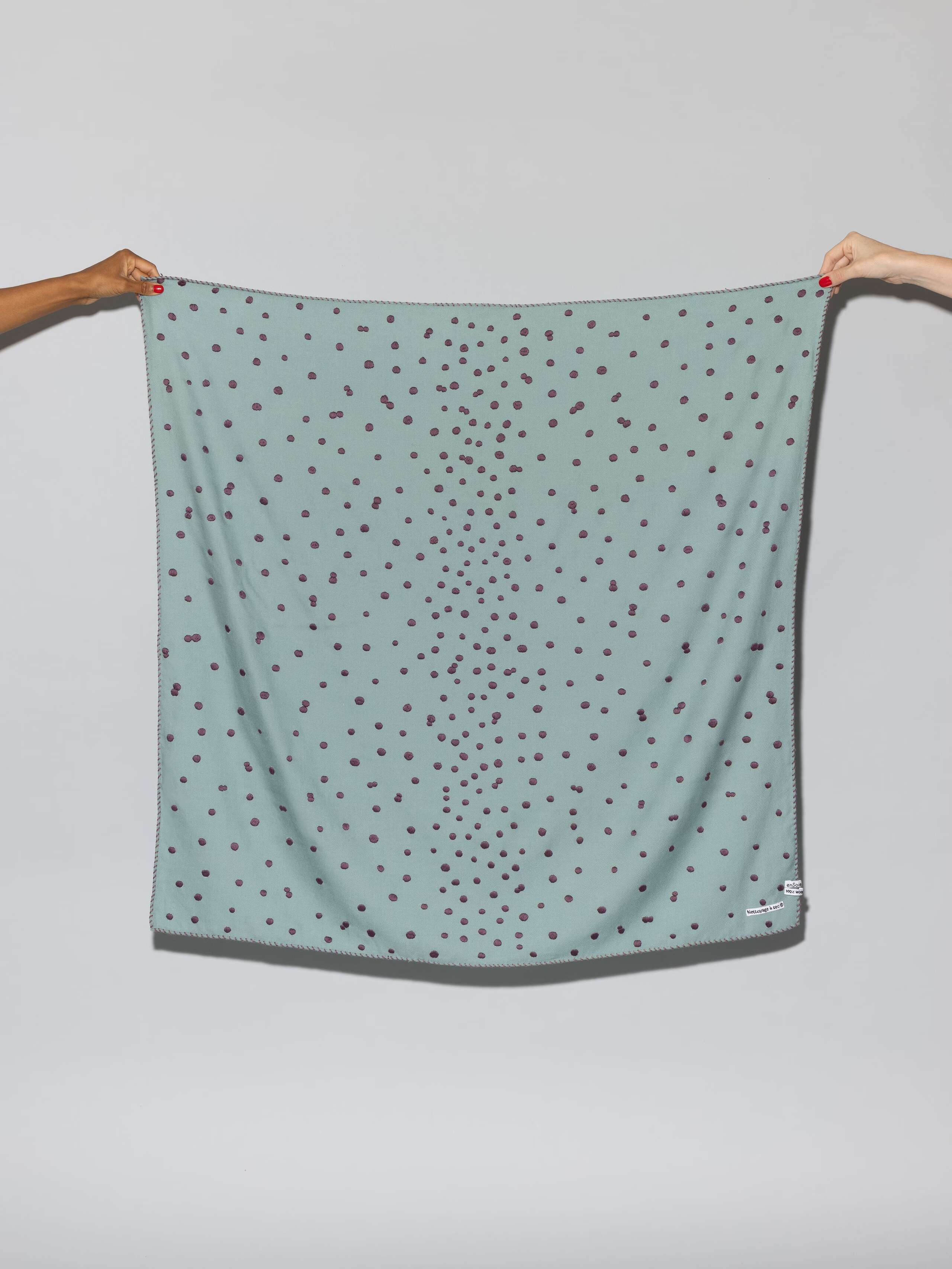 Leo wool scarf with dots in a light bluish rosemary green an purple embroidery