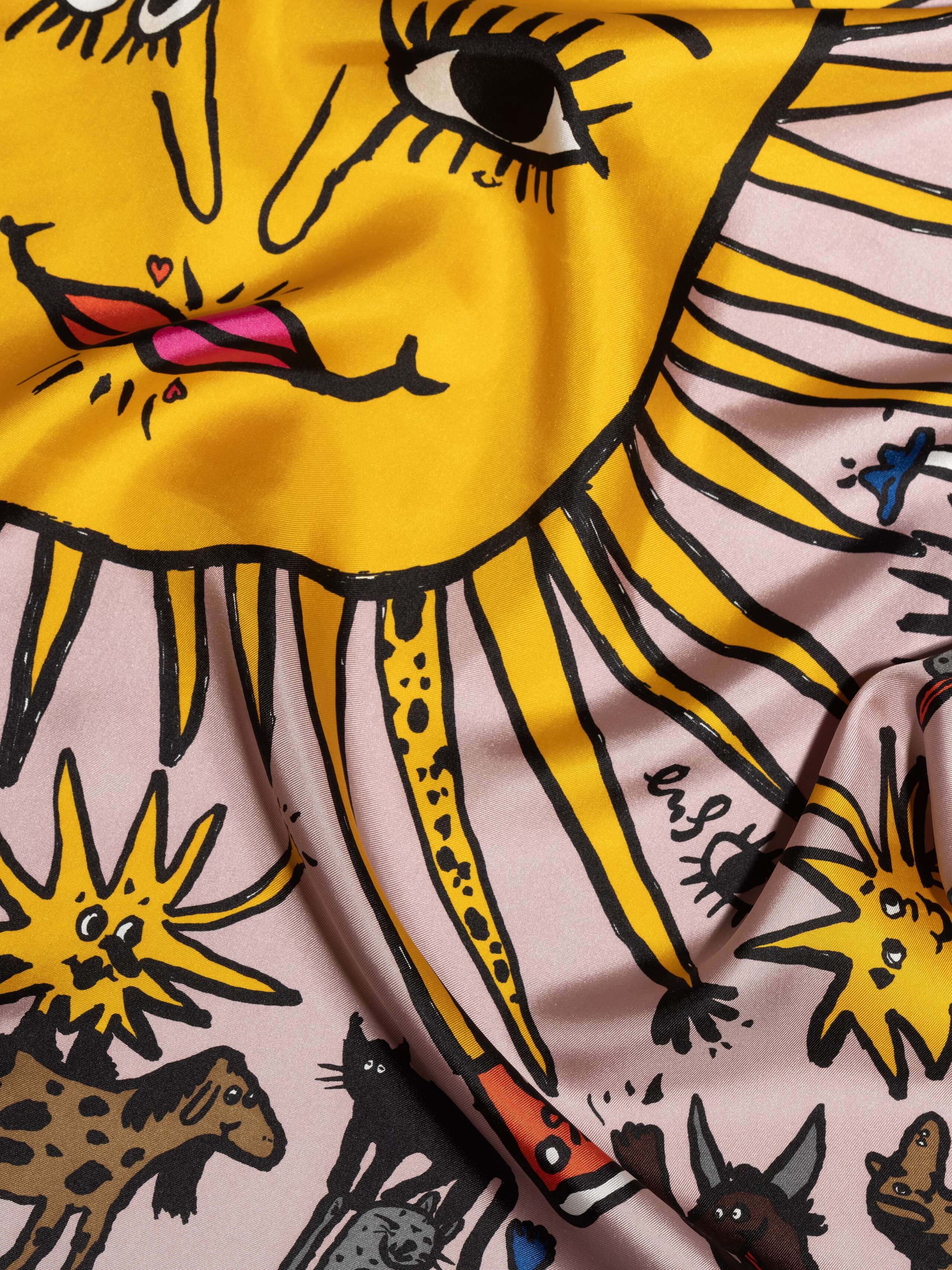 ensoie silk foulard in old rose with ojo de agua sun signature print detail