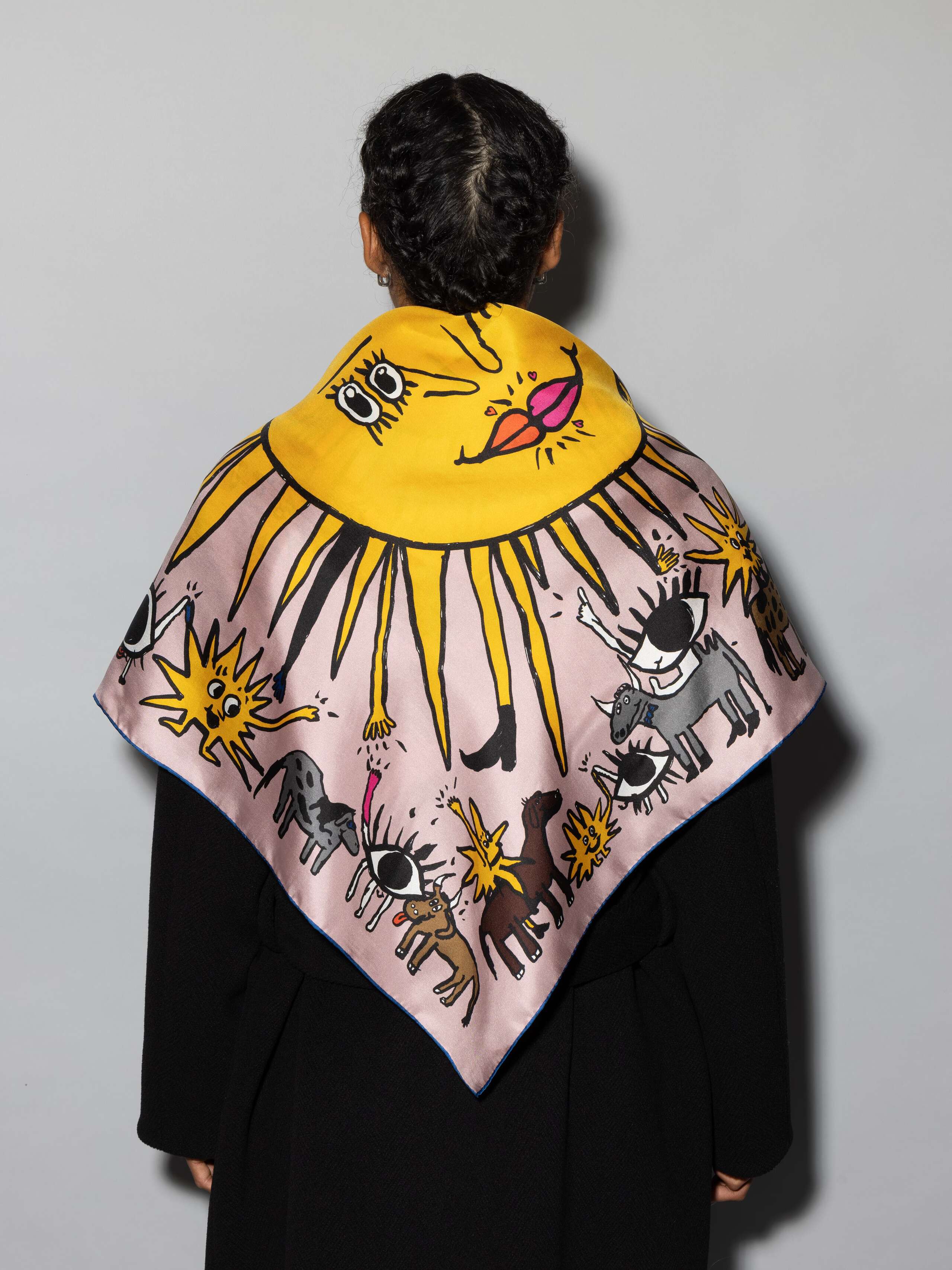 ensoie silk foulard in old rose with ojo de agua sun signature print model
