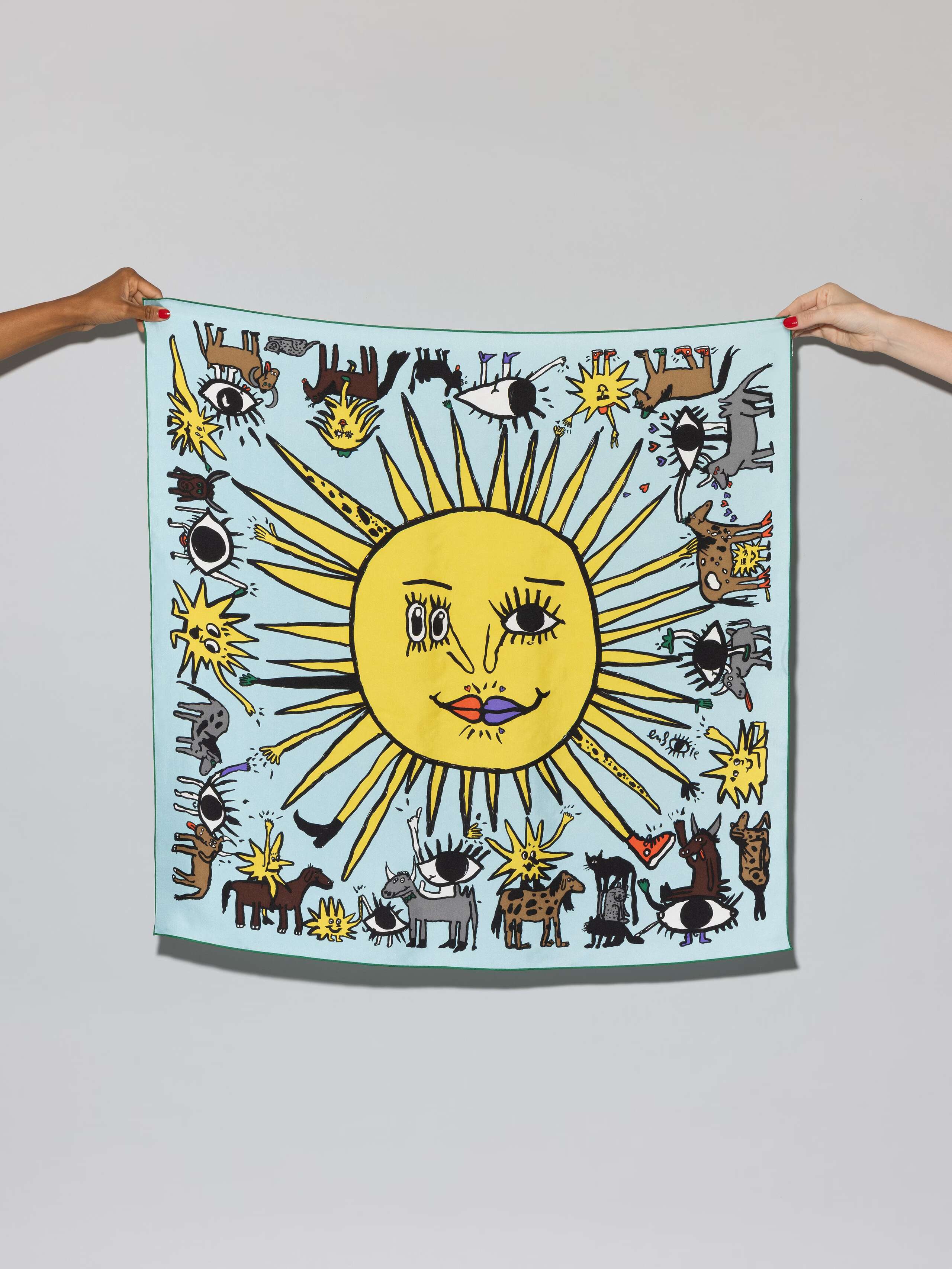 silk foulard in light blue with ojo de agua sun signature print packshot