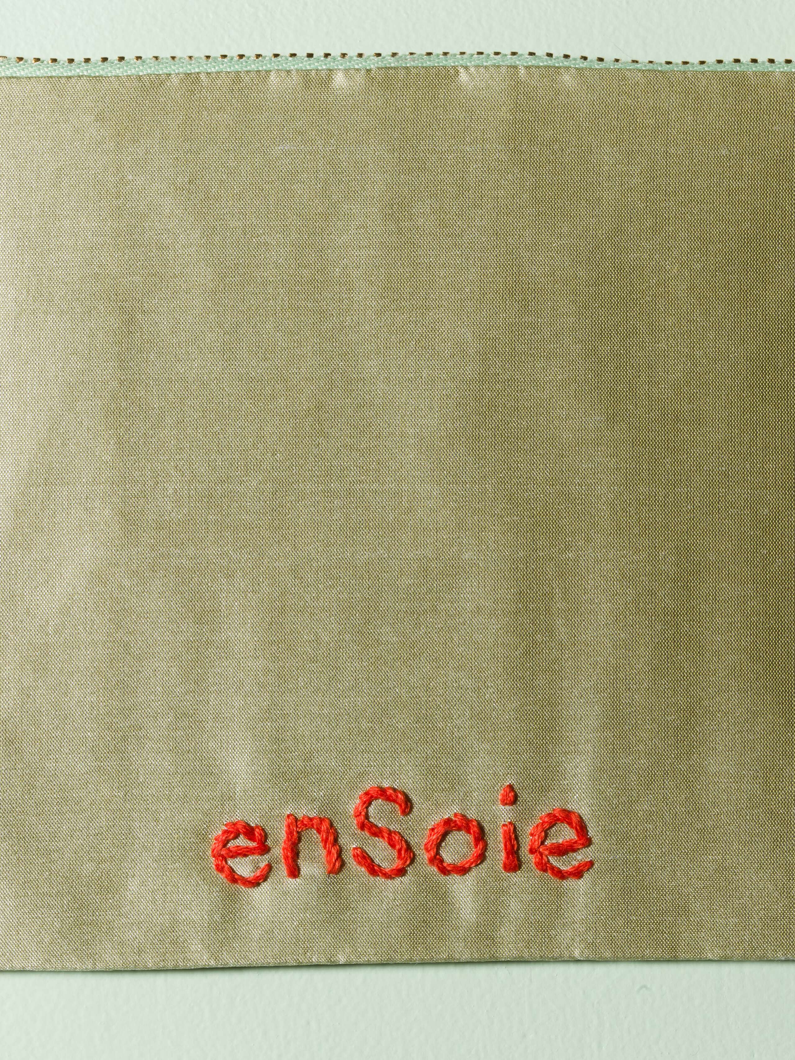 Beautiful silk clutch, Love rules forever embroidery enSoie embroidery, red embroidery on glossy pistache silk