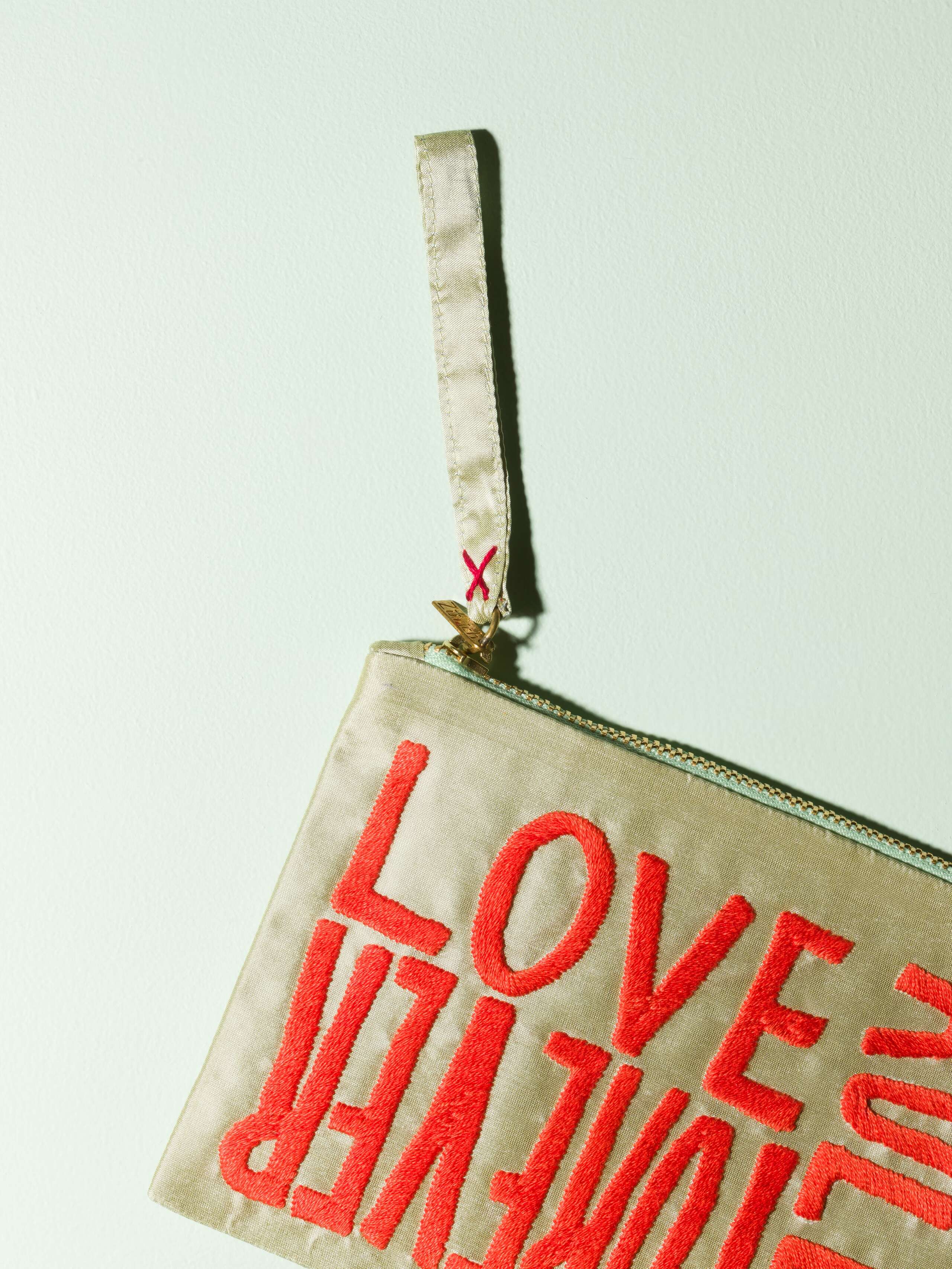 Beautiful silk clutch, Love rules forever embroidery enSoie embroidery, red embroidery on glossy pistache silk