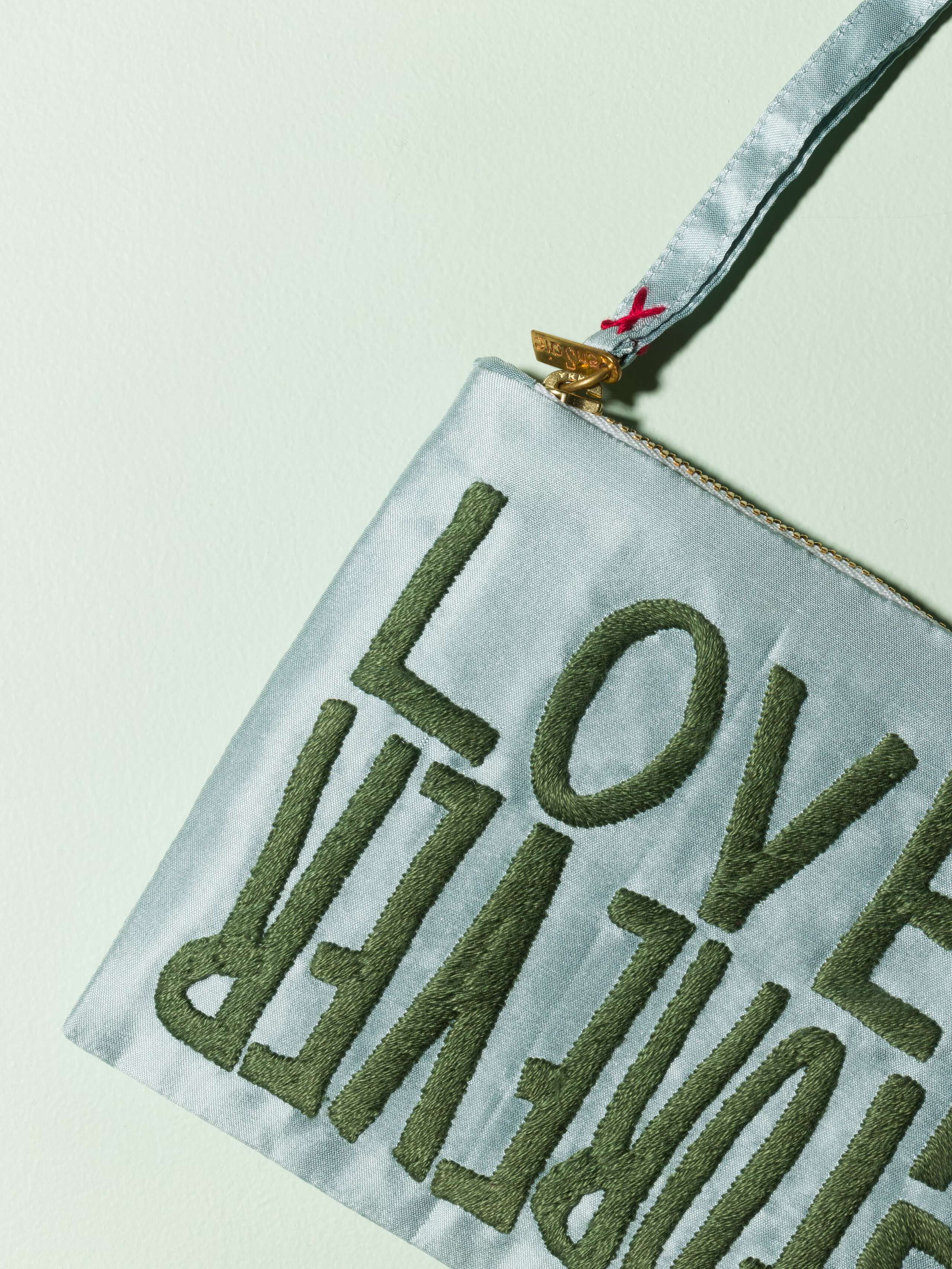 Beautiful silk clutch, Love rules forever embroidery enSoie embroidery, green embroidery on glossy light blue silk