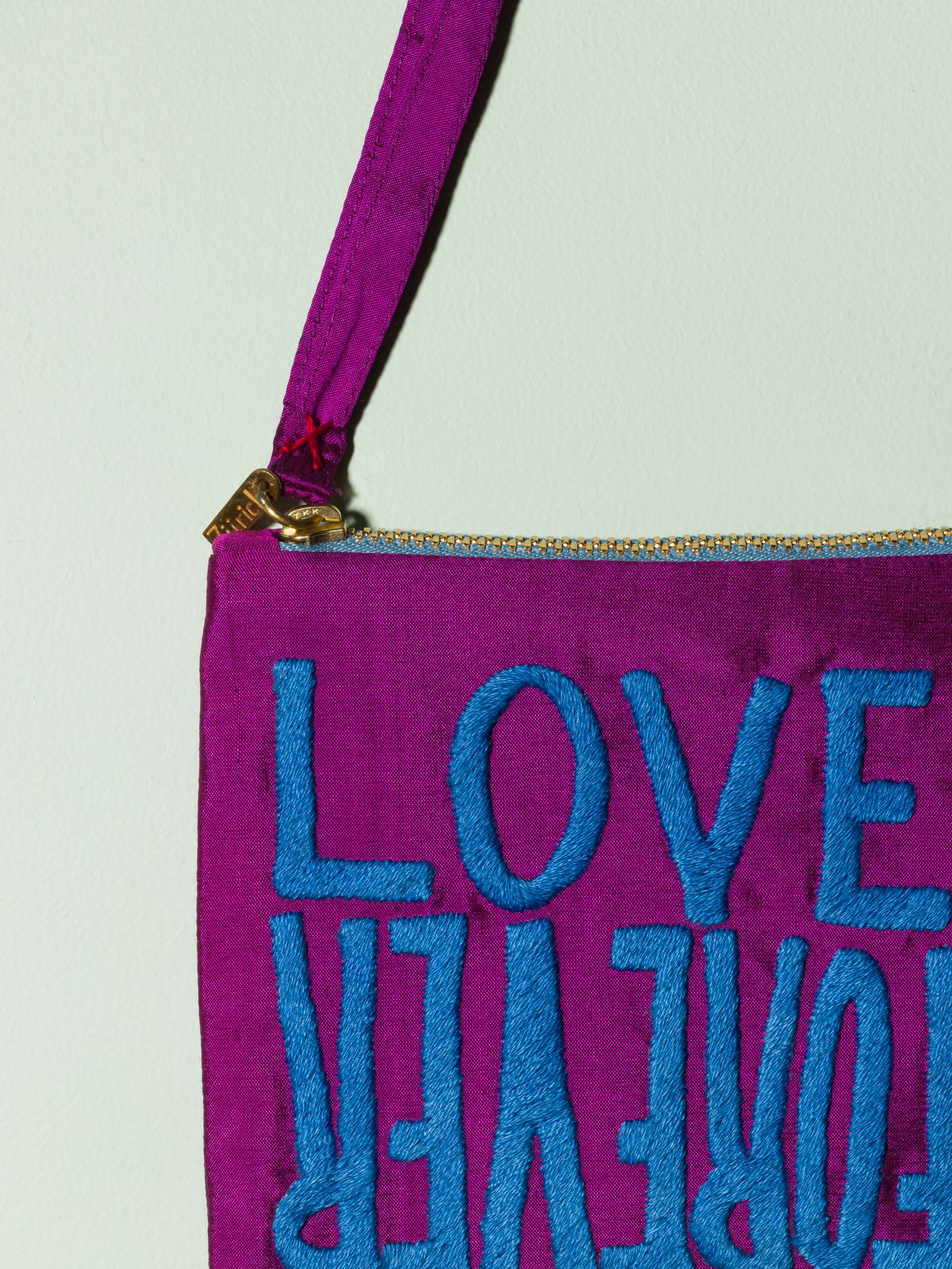 Beautiful silk clutch, Love rules forever embroidery enSoie embroidery, blue embroidery on glossy purple silk
