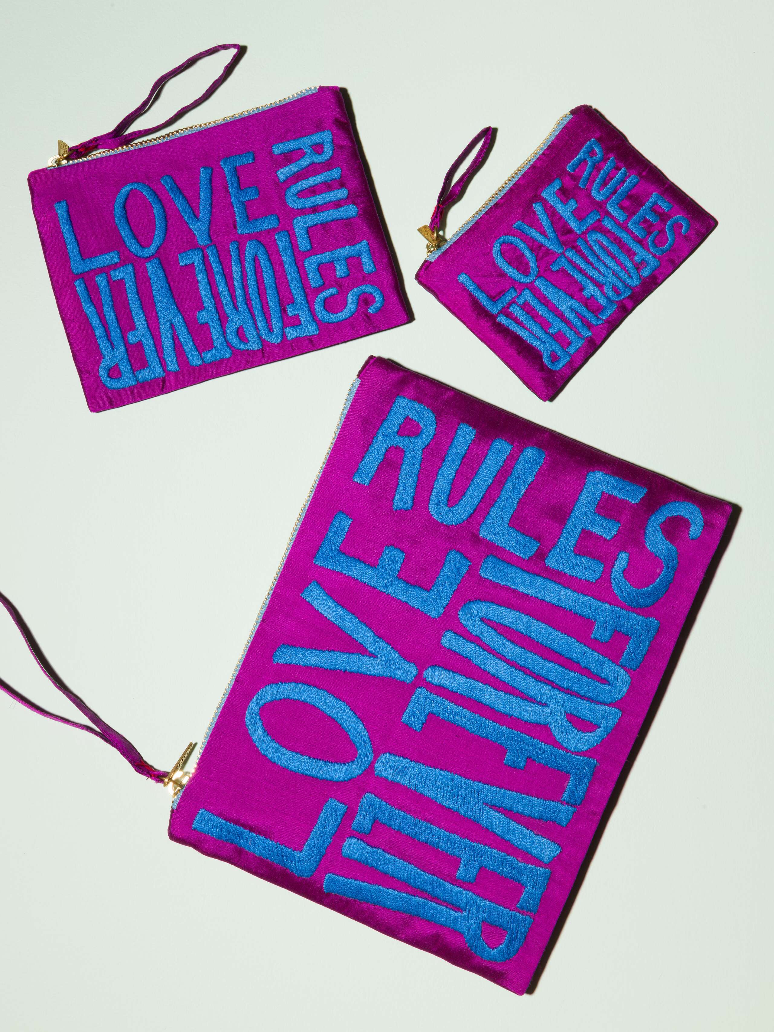 Beautiful silk clutch, Love rules forever embroidery enSoie embroidery, blue embroidery on glossy purple silk