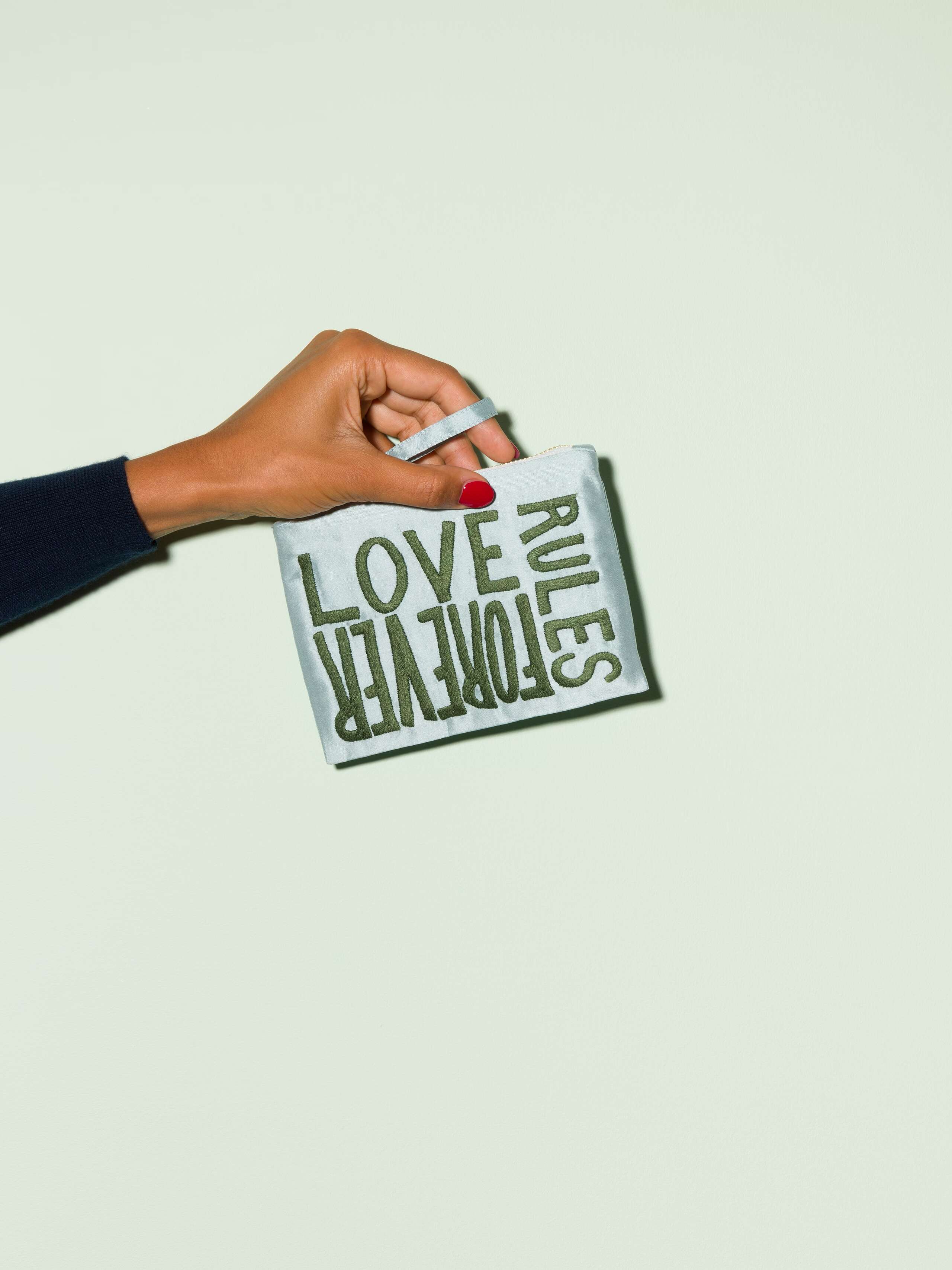 Beautiful silk clutch, Love rules forever embroidery enSoie embroidery, green embroidery on glossy light blue silk