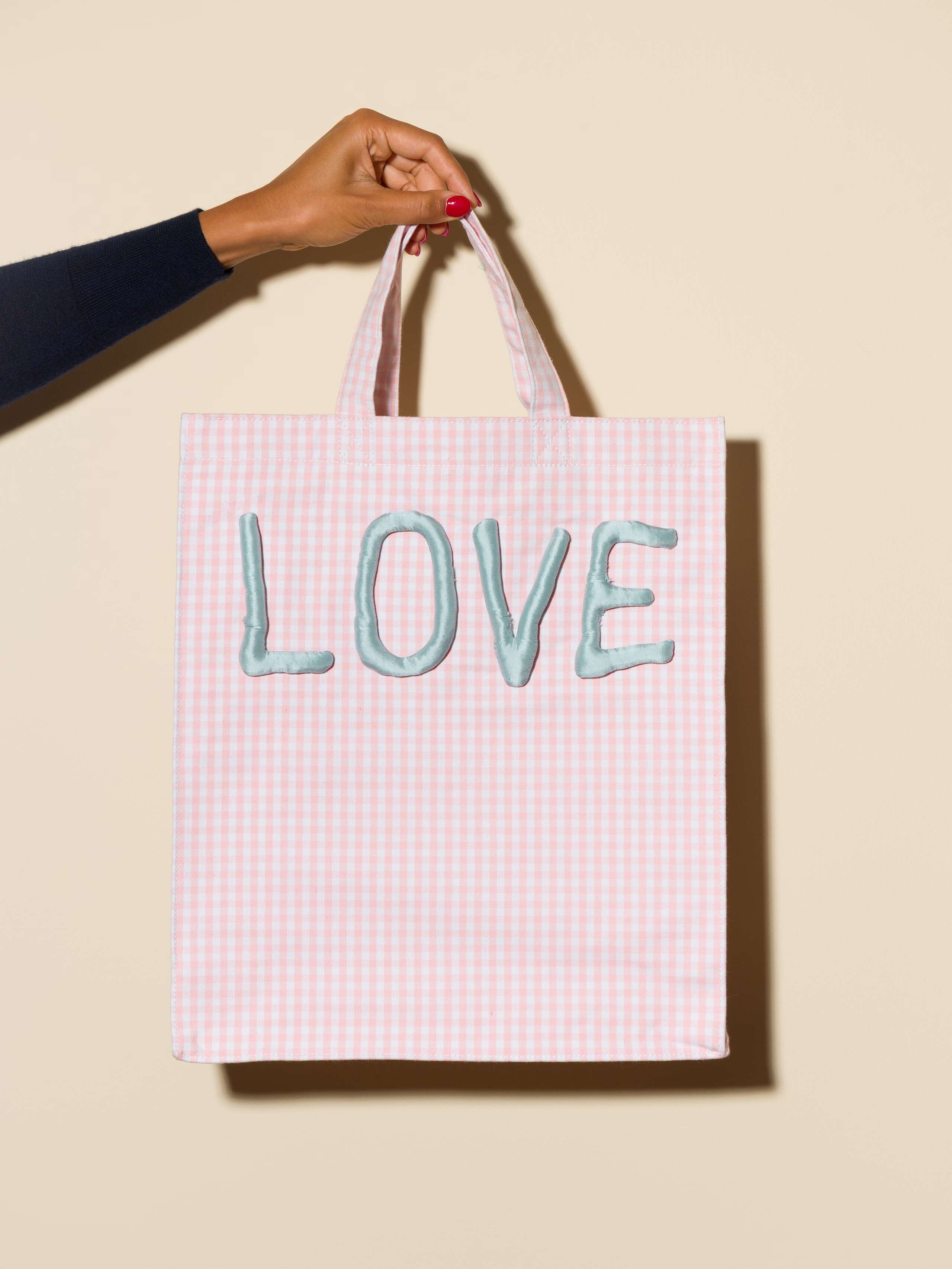 beautiful bag in light pink shade with vichy pattern and LOVE application