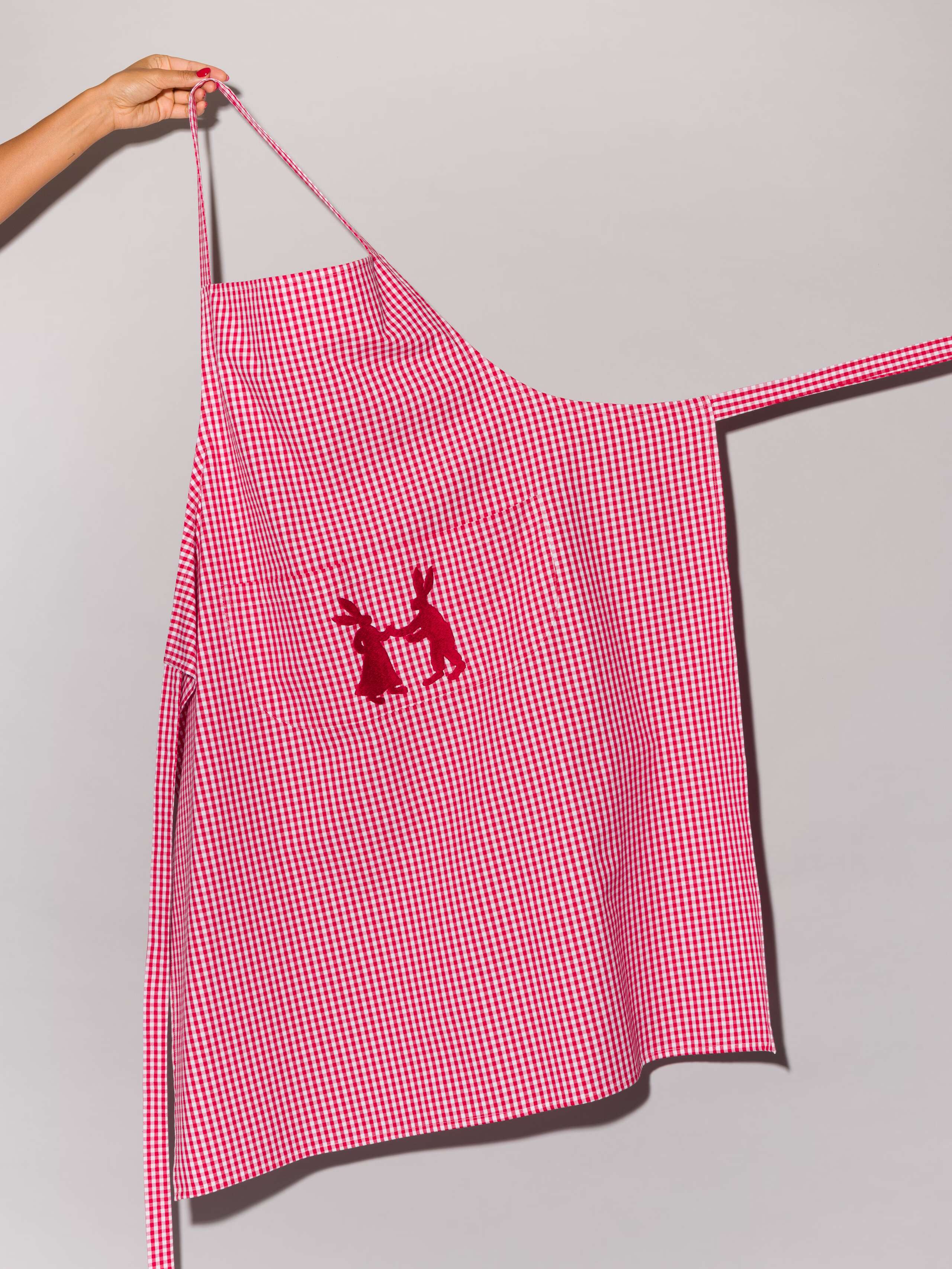 Vichy cotton apron with hand embroidery of dancing rabbits in red