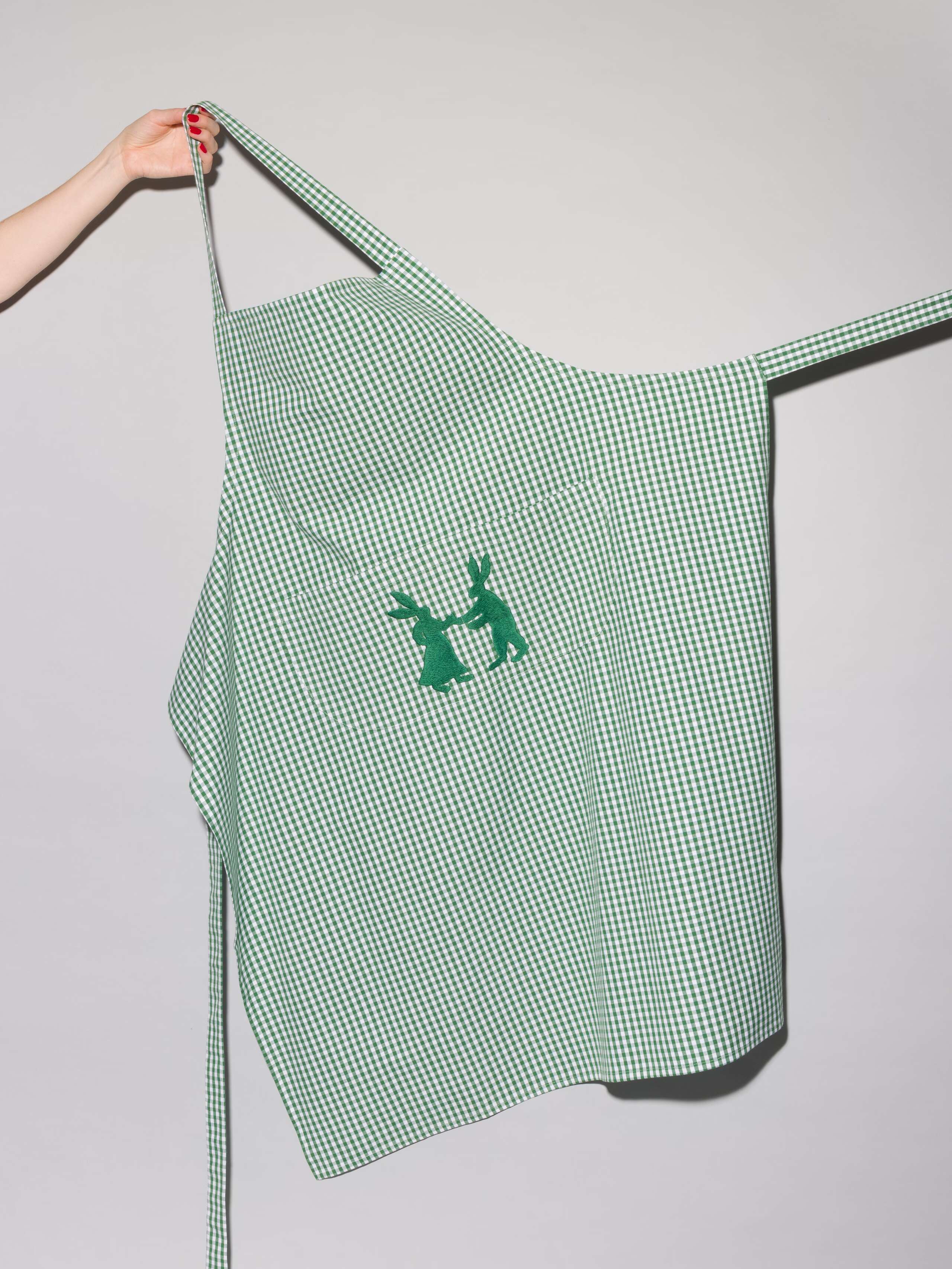 Vichy cotton apron with hand embroidery of dancing rabbits in green