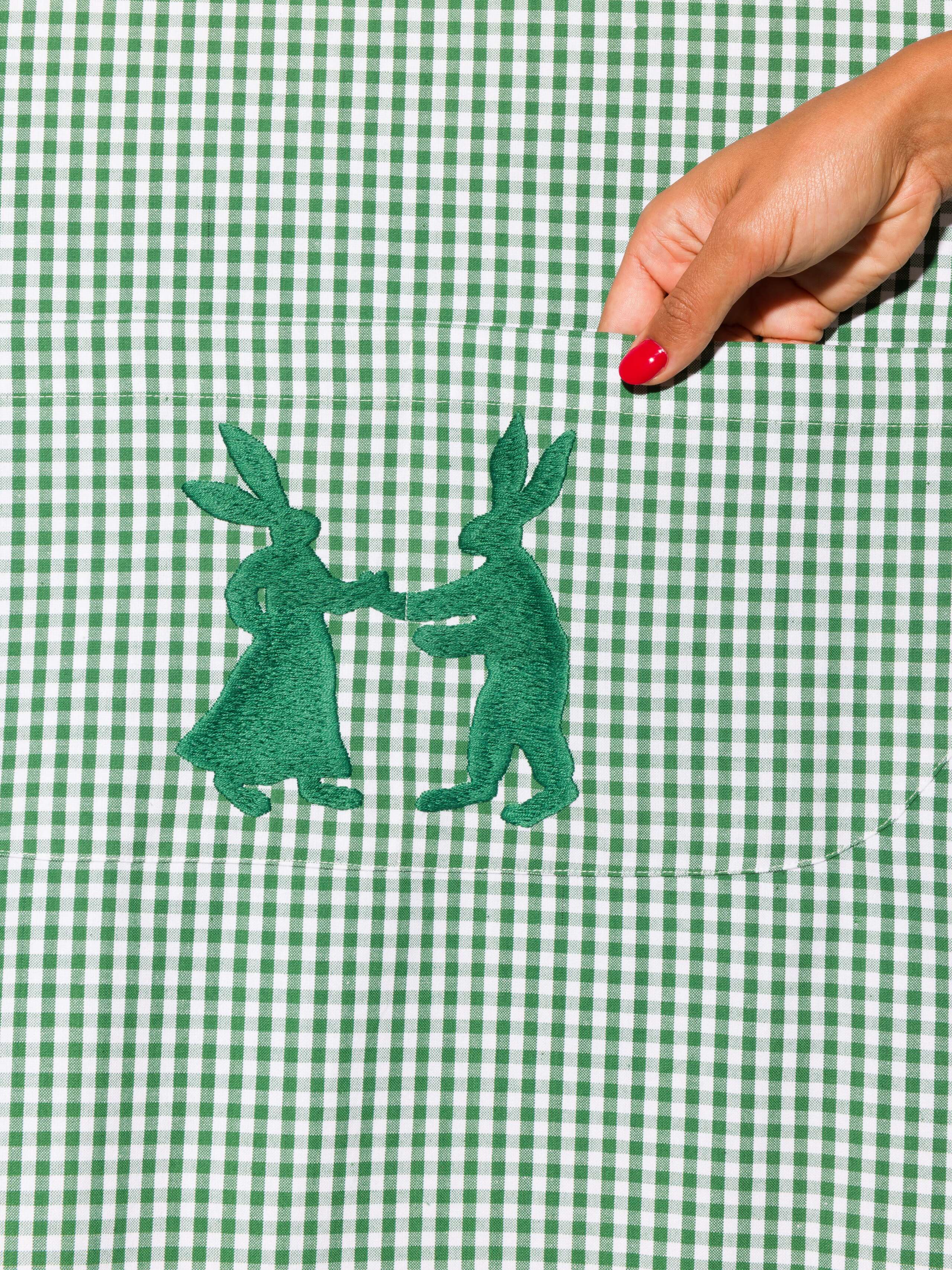 Vichy cotton apron with hand embroidery of dancing rabbits in green