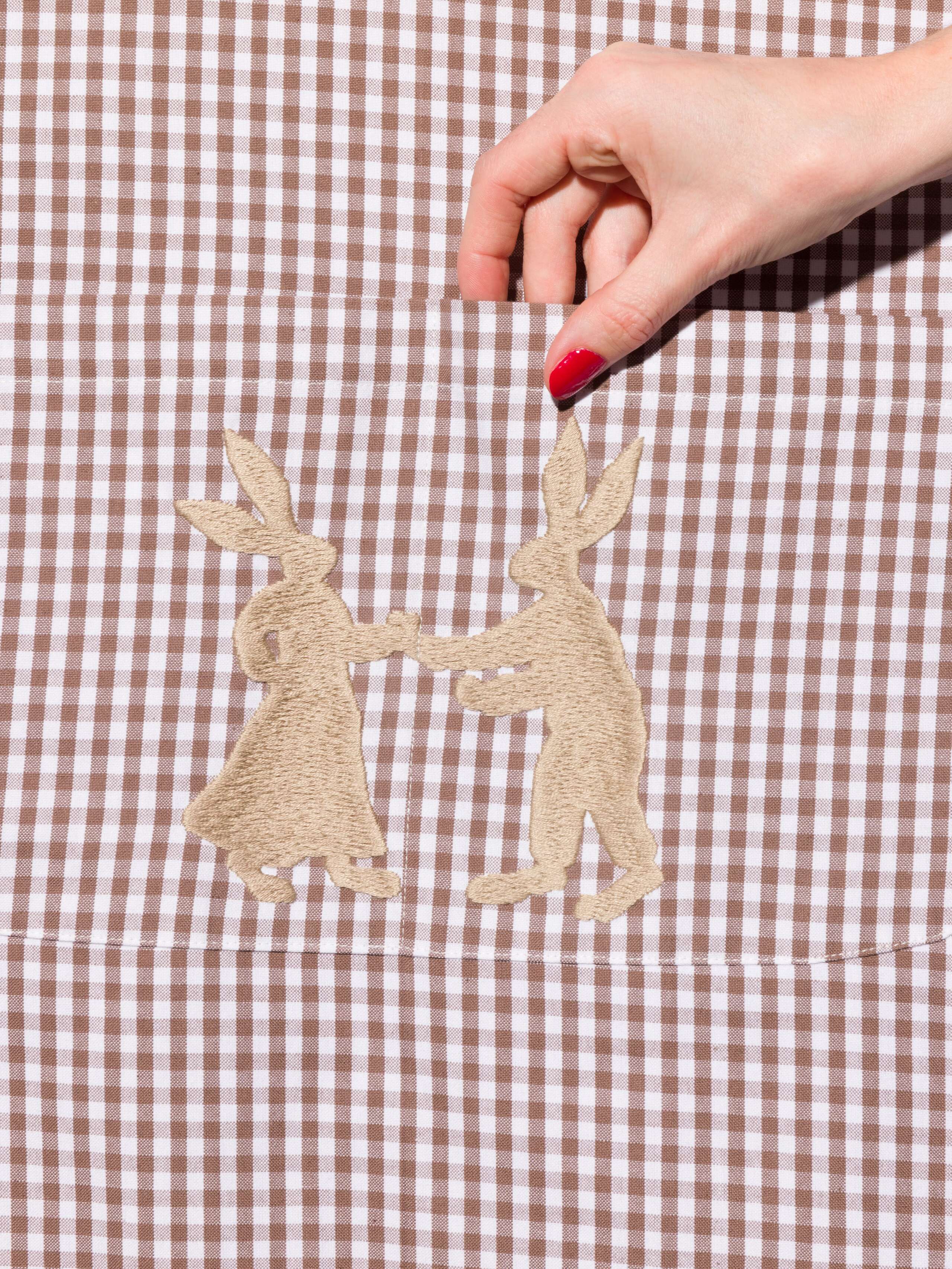 Vichy cotton apron with hand embroidery of dancing rabbits in moon rock