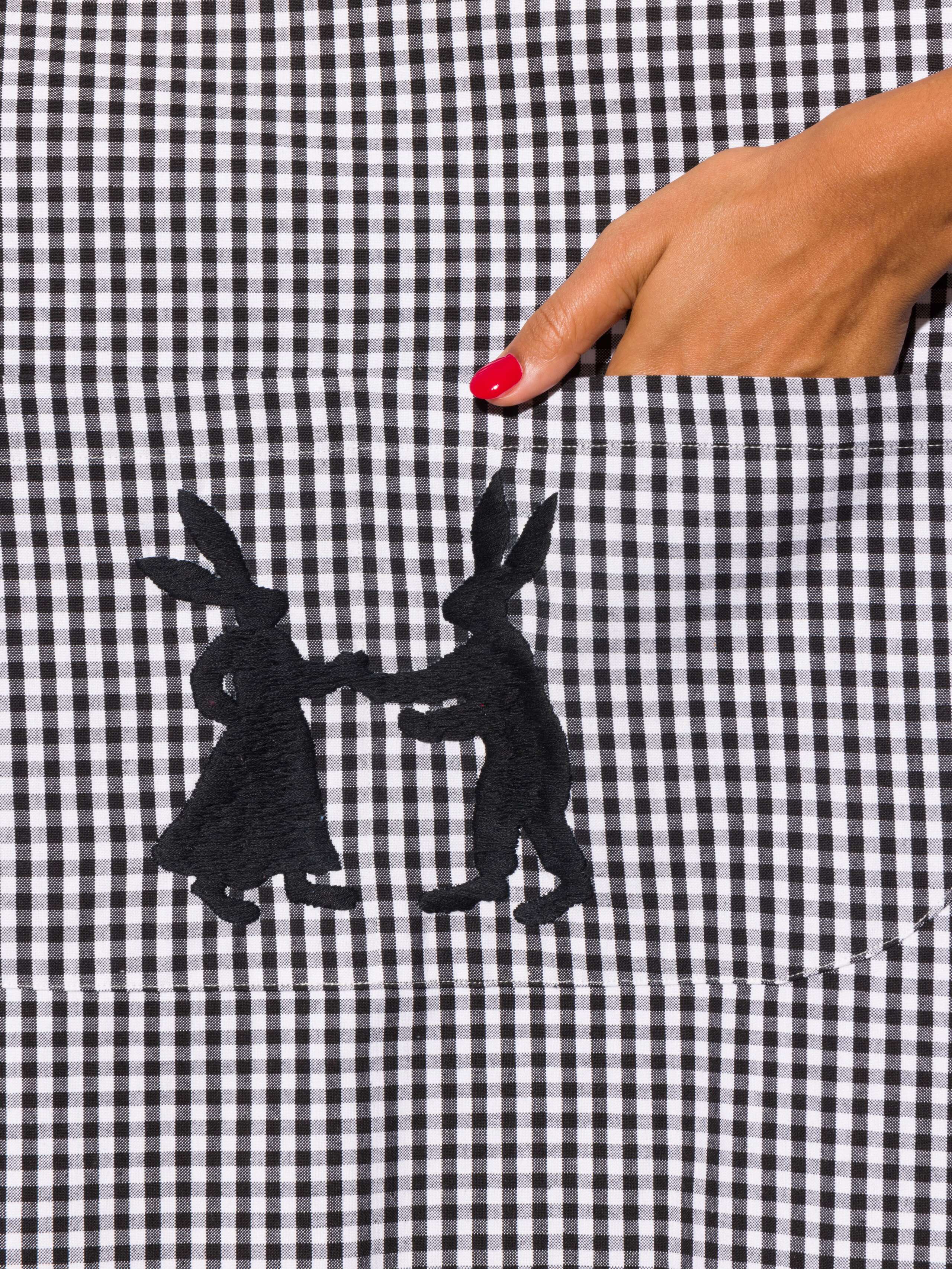 Vichy cotton apron with hand embroidery of dancing rabbits in black