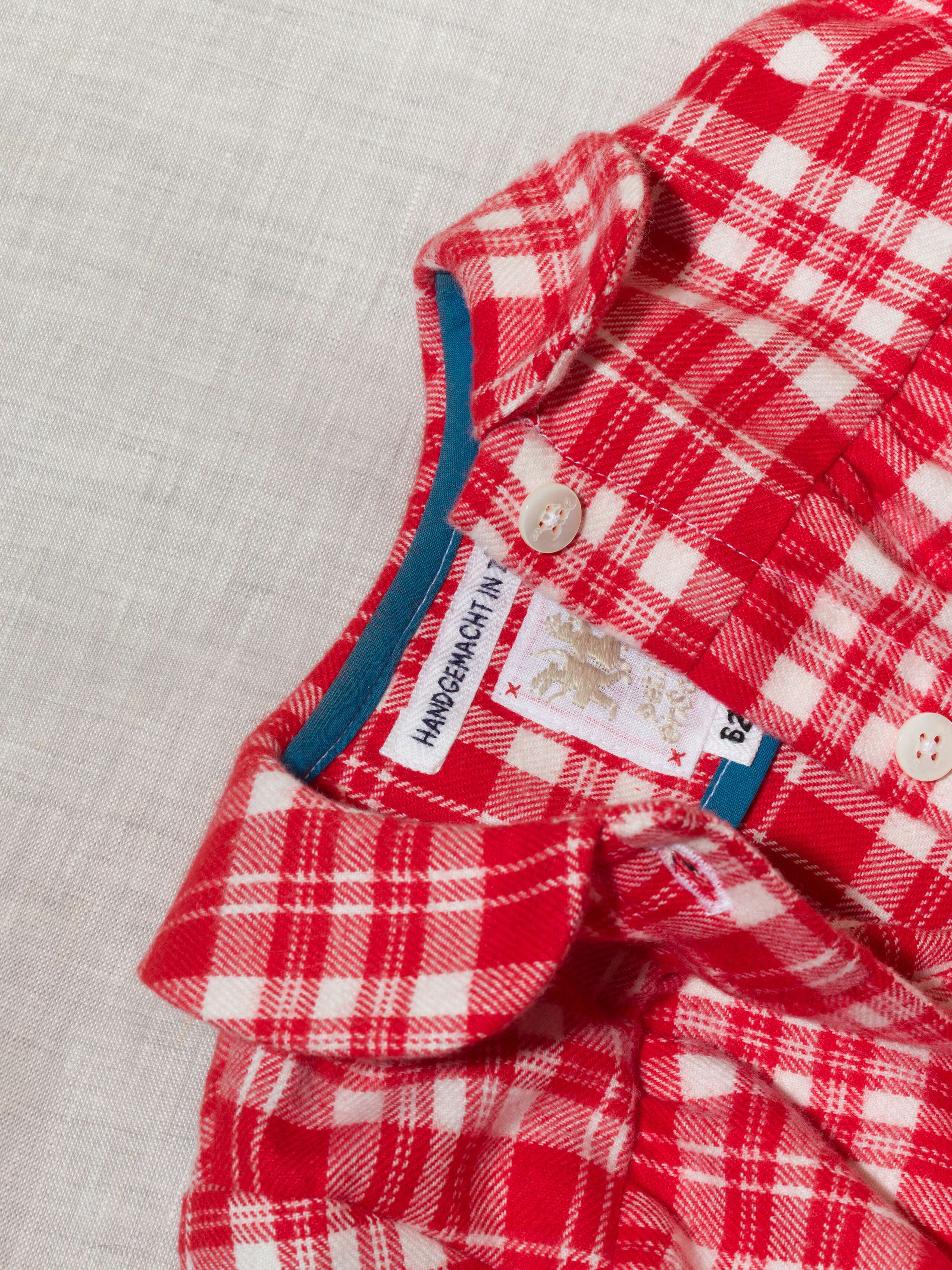 Beautiful handmade cotton flannel baby body in a soft check pattern with long sleeves, red