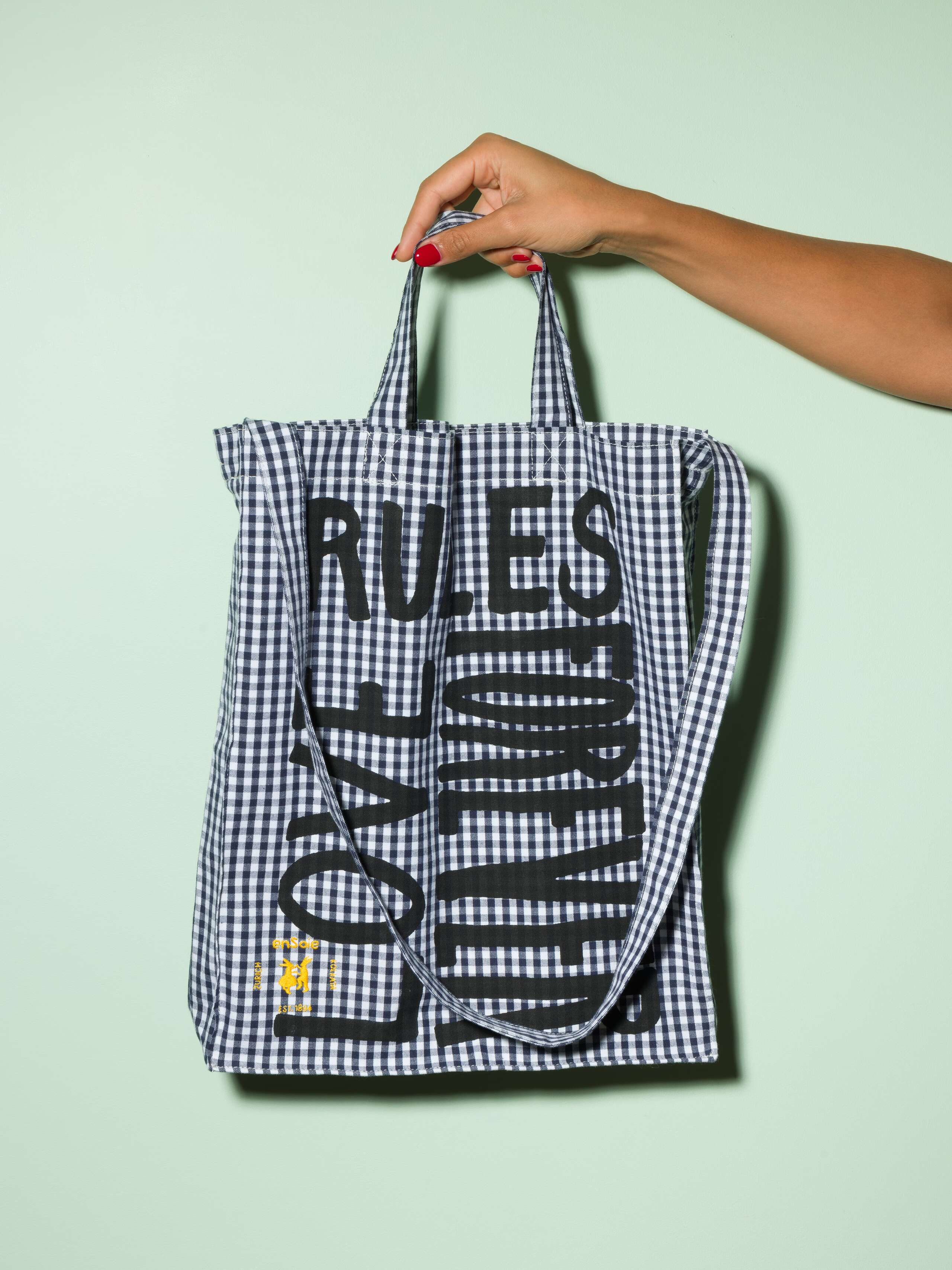  cotton tote bag with a navy vichy pattern and a black print that says "Love rules forever" and a rabbit ebroidery