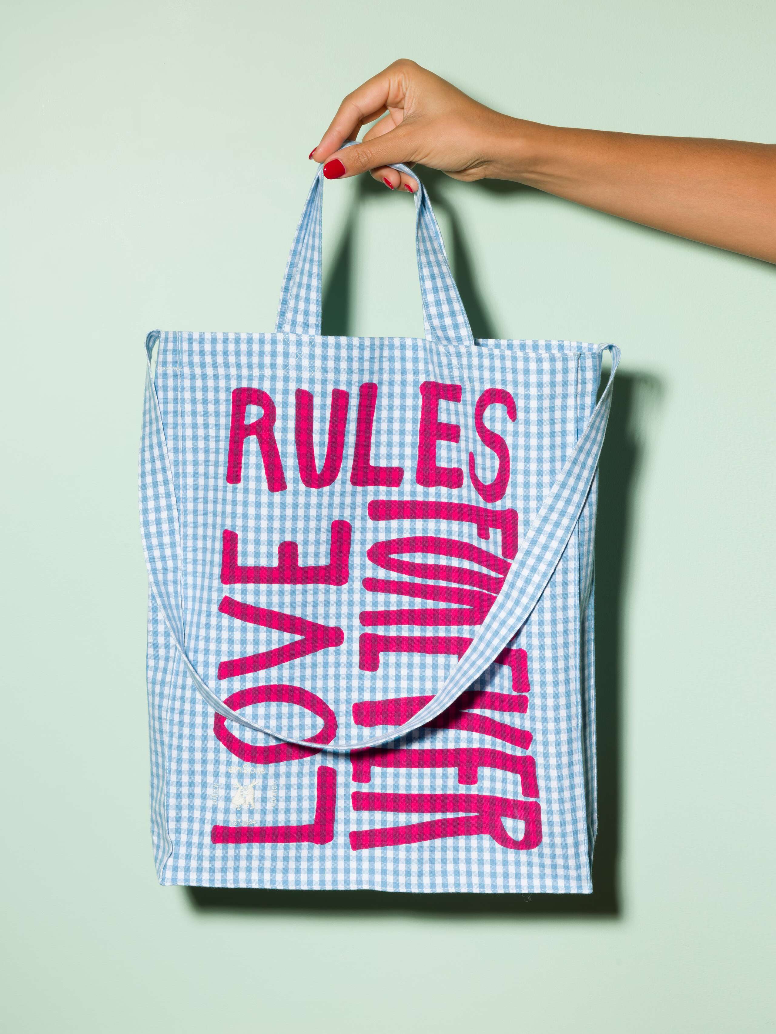  cotton tote bag with a lightblue vichy pattern and a pink print that says "Love rules forever" and a rabbit ebroidery