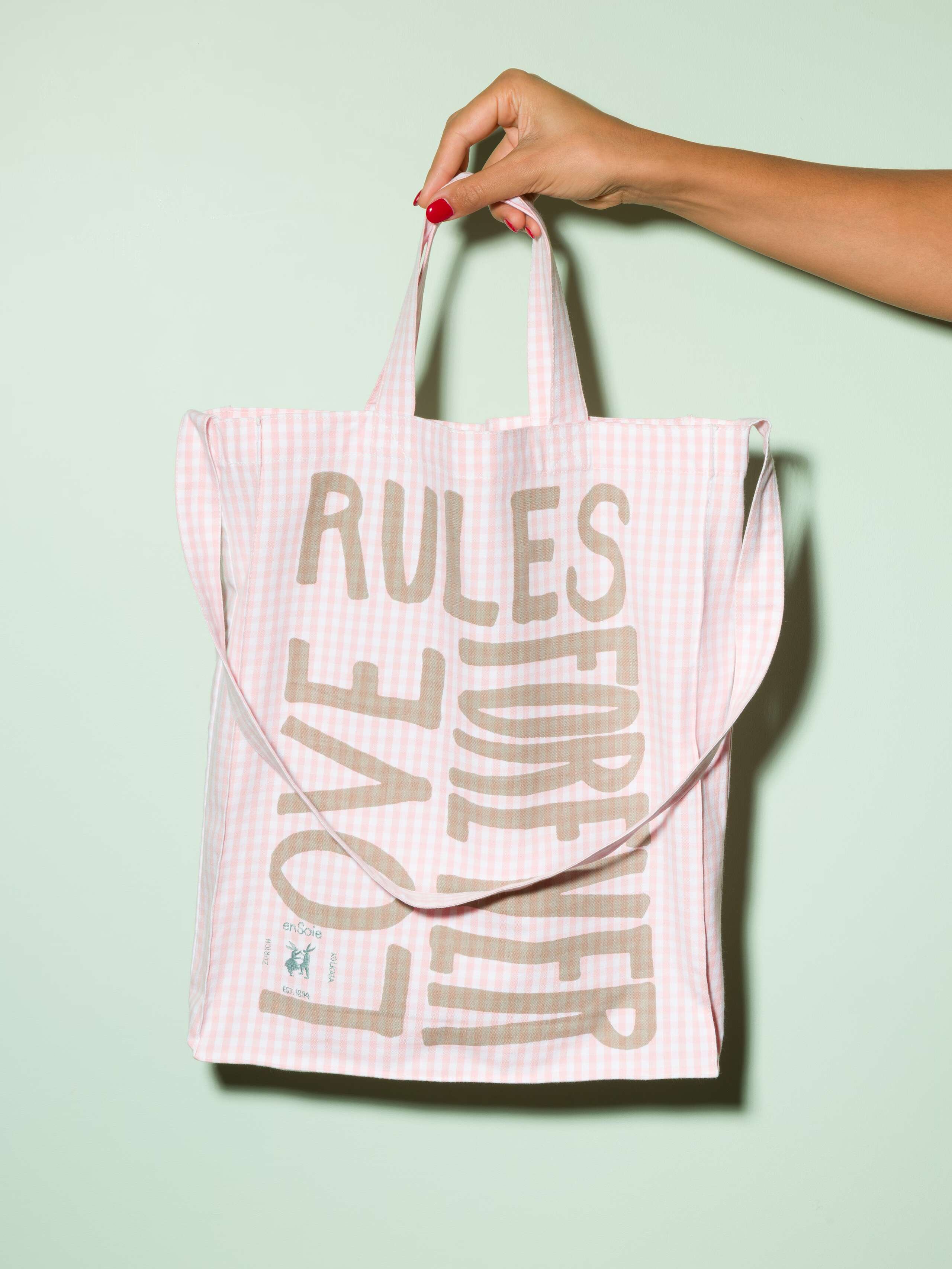  cotton tote bag with a pink vichy pattern and a beige print that says "Love rules forever" and a rabbit ebroidery