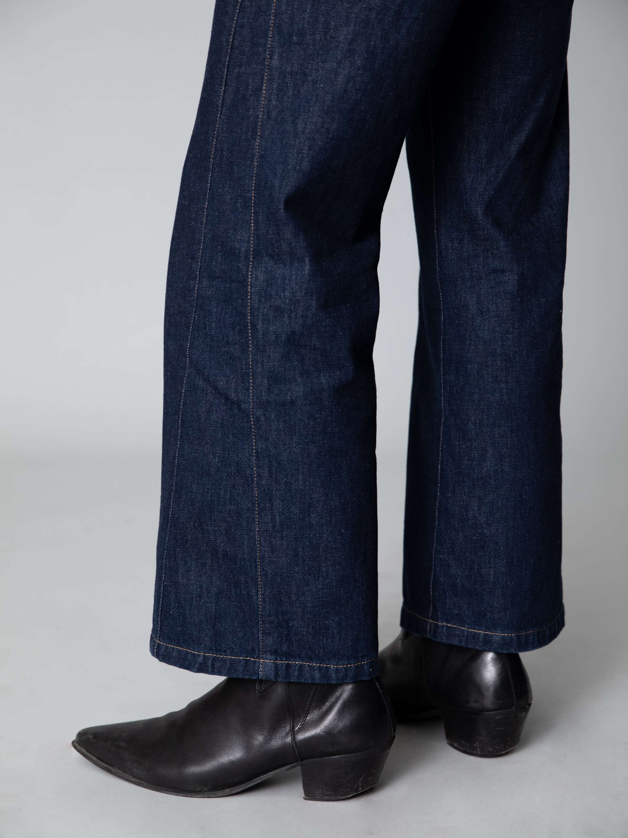 Male model wearing a beautiful indigo blue jeans