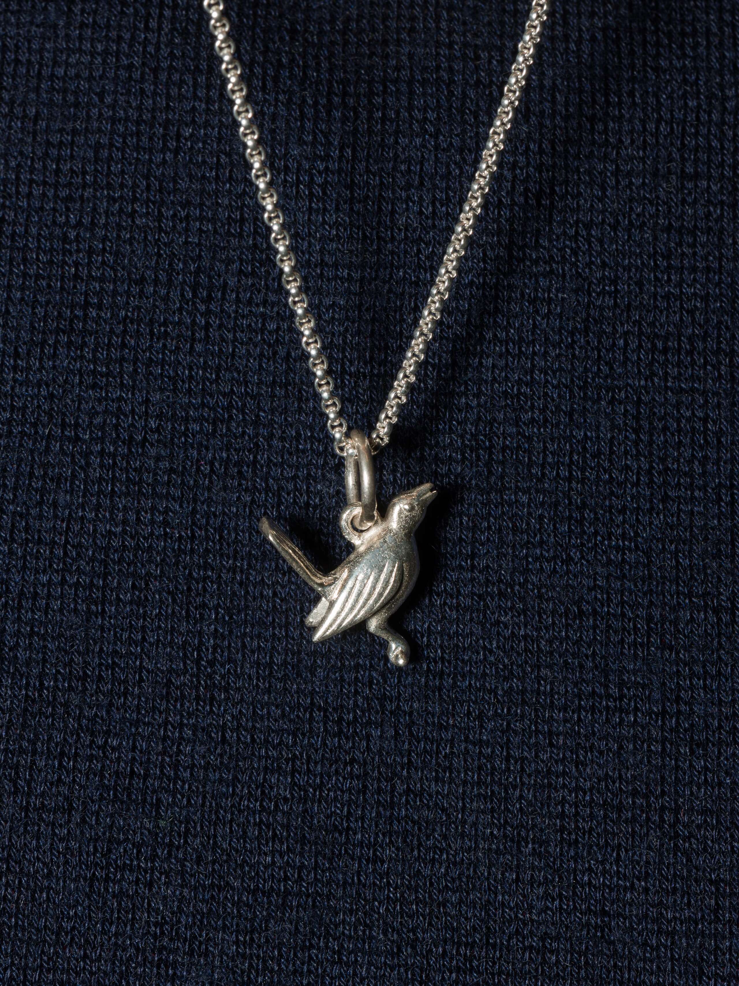 Picture of a cute bird pendant in silver