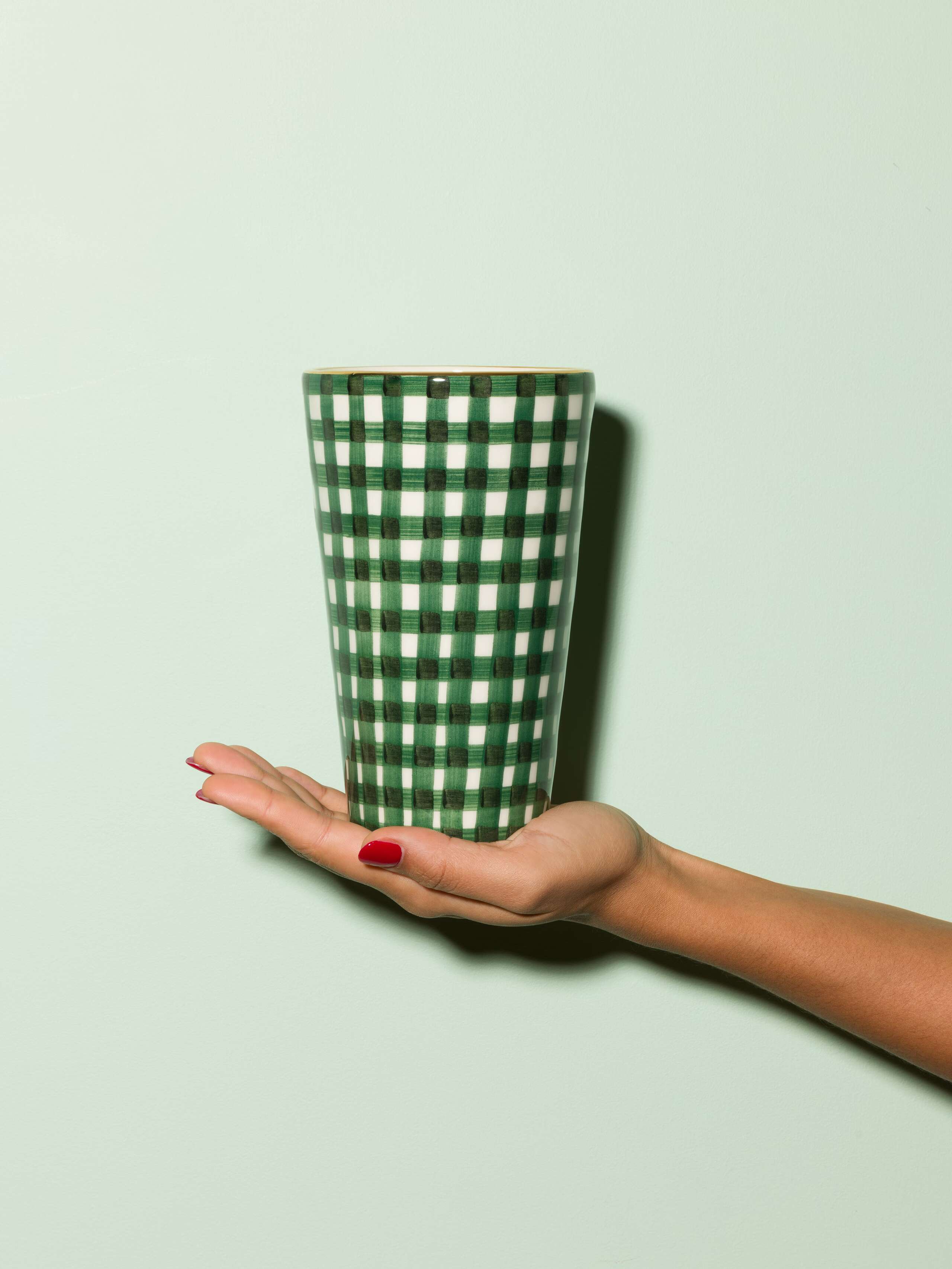 Picture of a small vase featuring a beautiful vichy check pattern in dark green