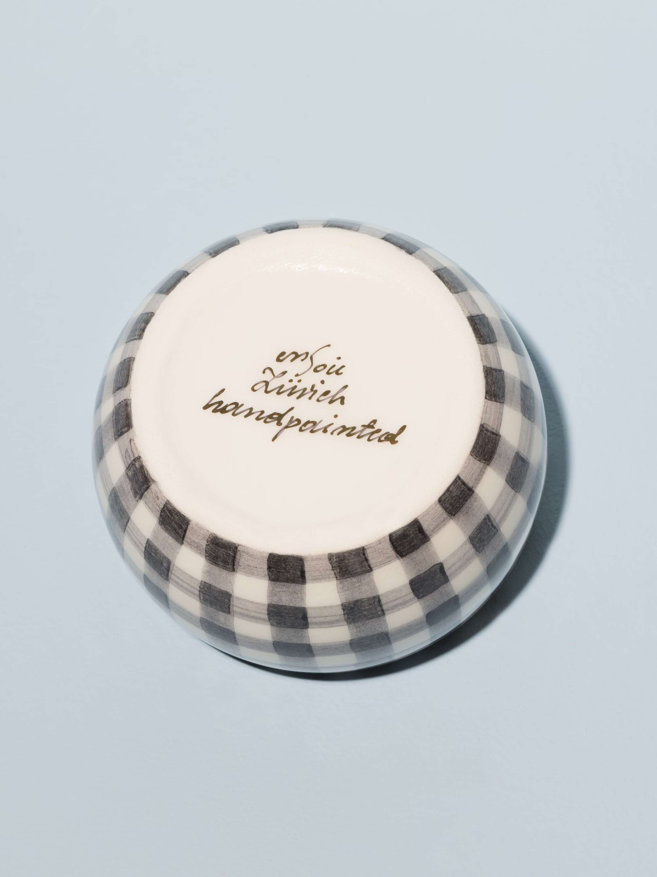 Picture of a cute small sugar bowl featuring a nice black vichy check pattern