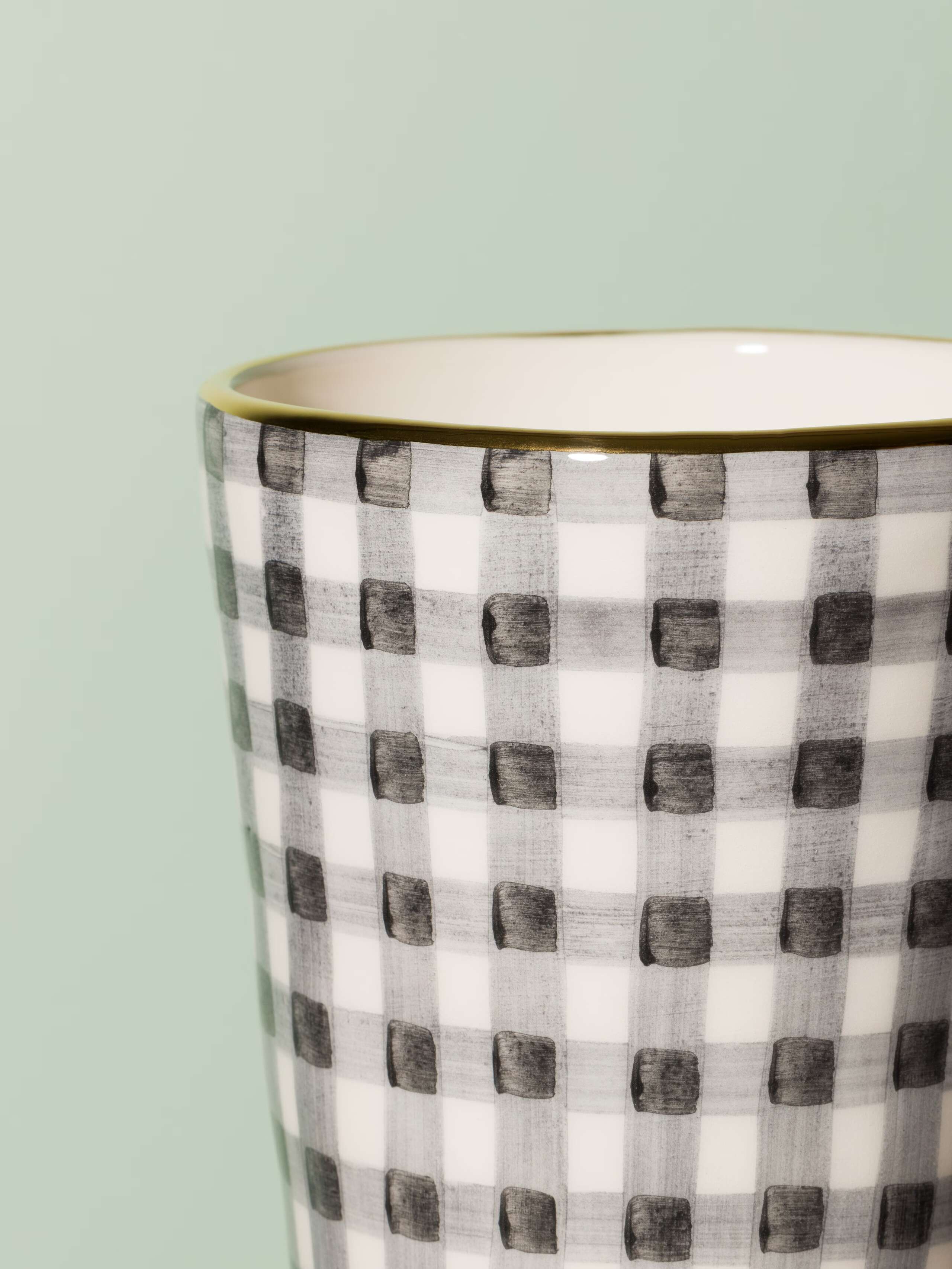 Picture of a small vase featuring a beautiful vichy check pattern in black