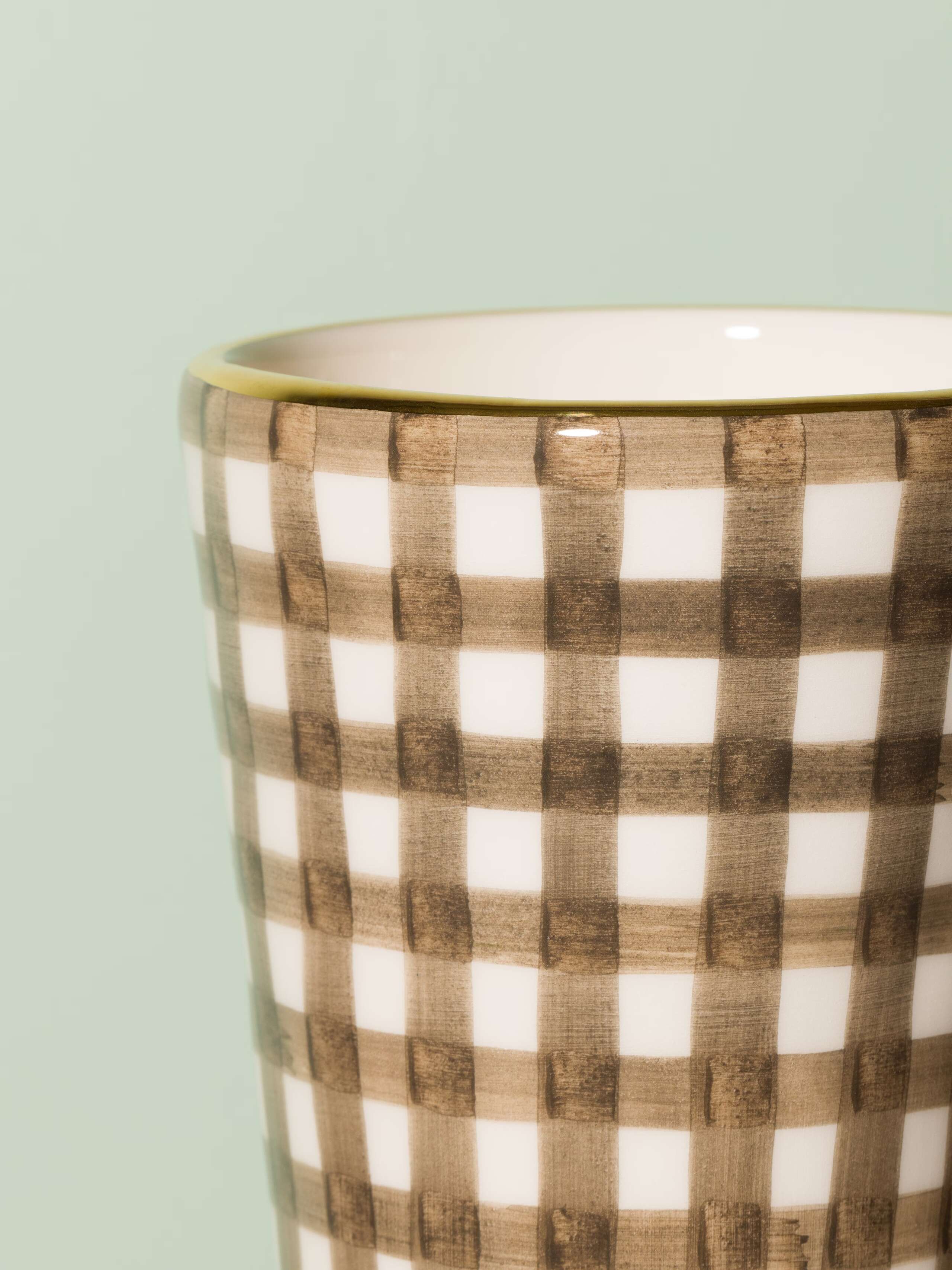 Picture of a small vase featuring a beautiful vichy check pattern in warm brown
