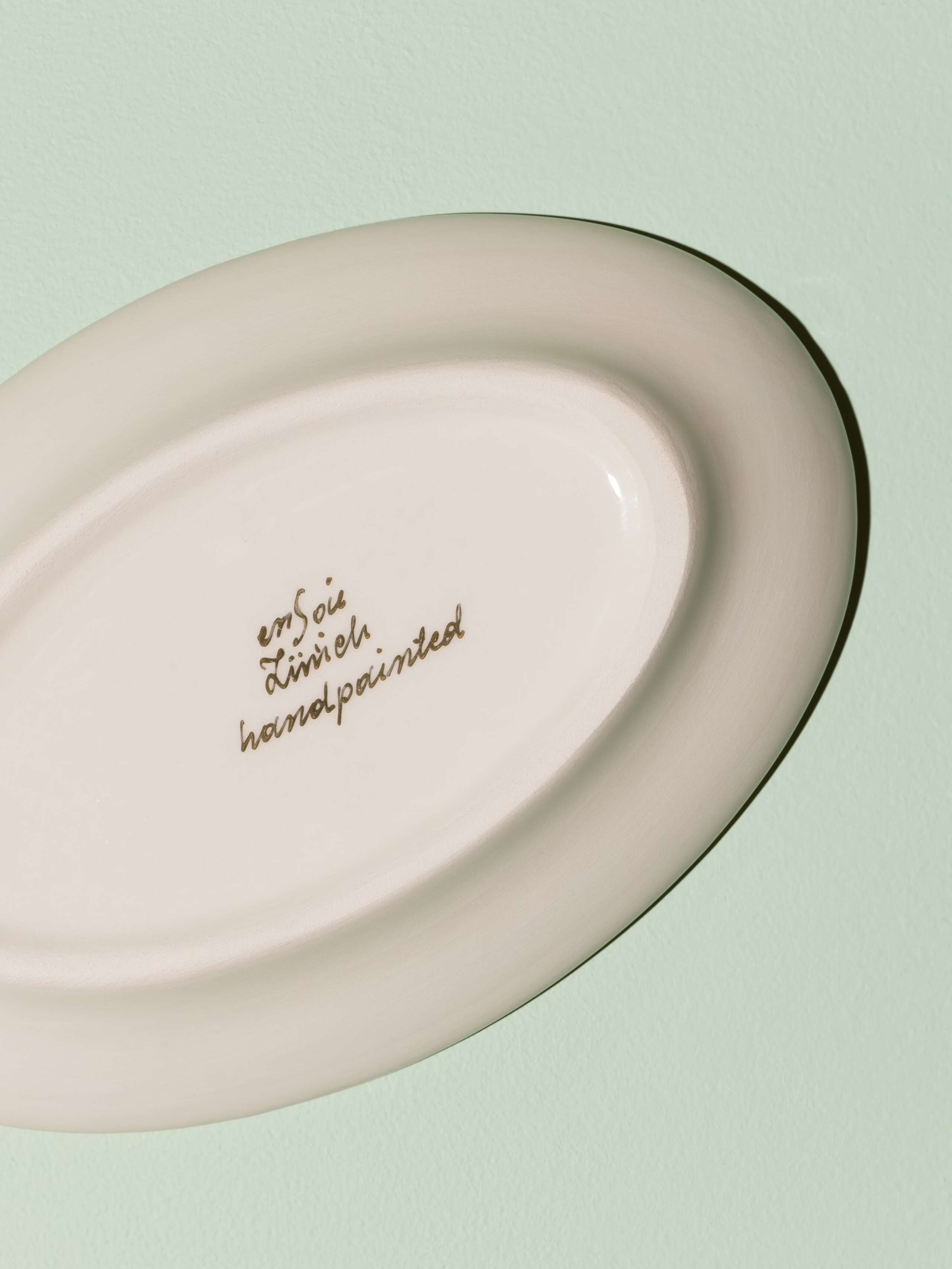 Picture of a beautiful handmade tapas plate featuring a classic ermine pattern