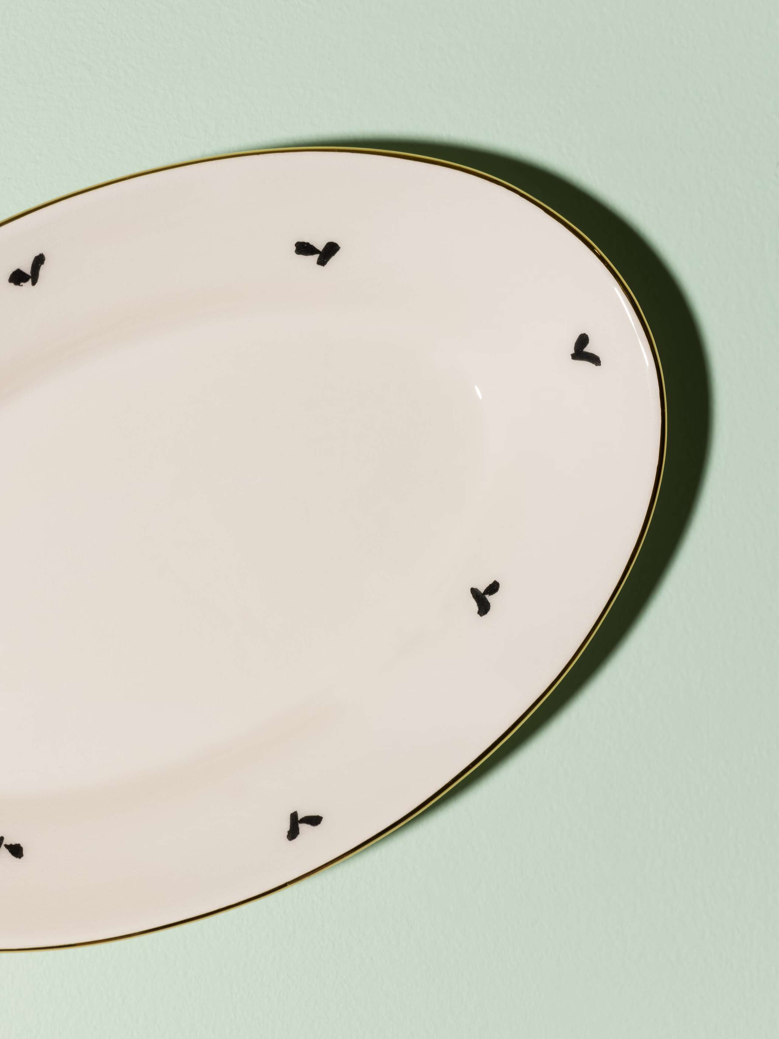 Picture of a beautiful handmade tapas plate featuring a classic ermine pattern