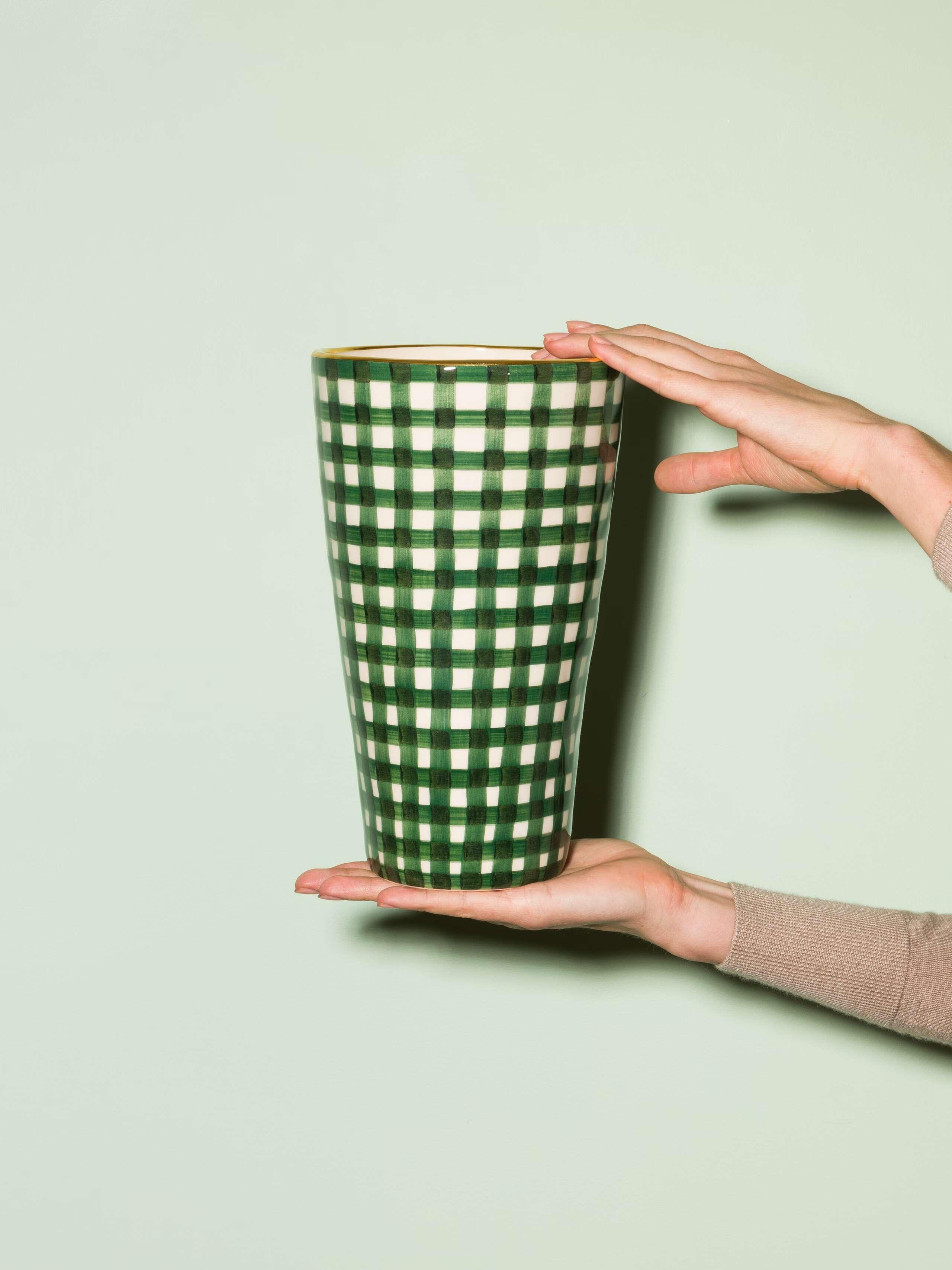Picture of a handmade and handprinted big vase made of ceramic featuring a green vichy check pattern