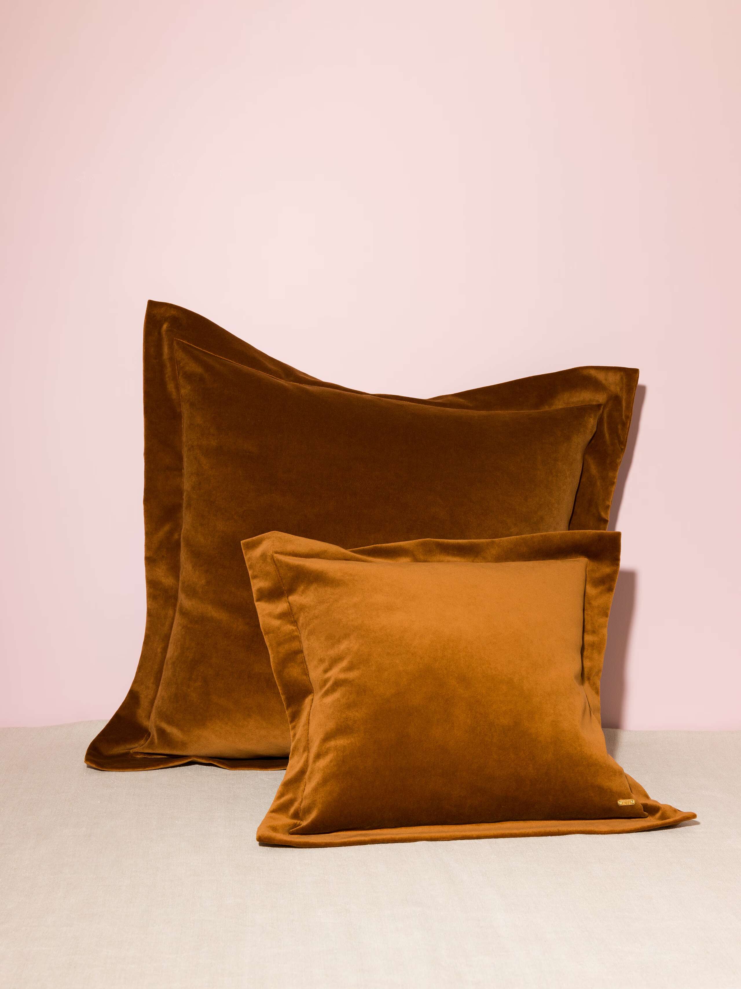 Picture of a beautiful pillow cover made of warm brown cotton velvet