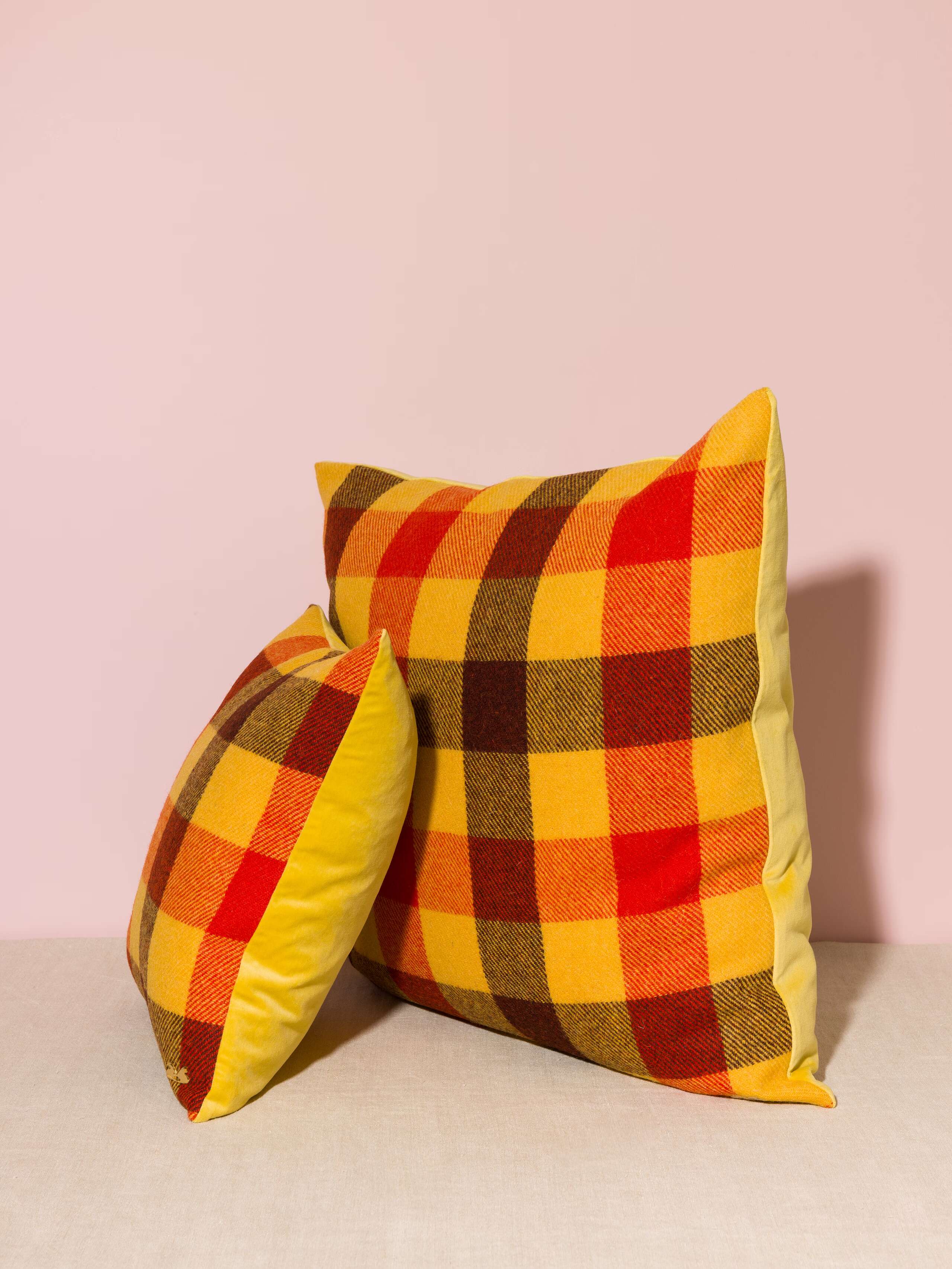 Picture of two beautiful pillow covers made of colourful Harris Tweed and yellow cotton velvet