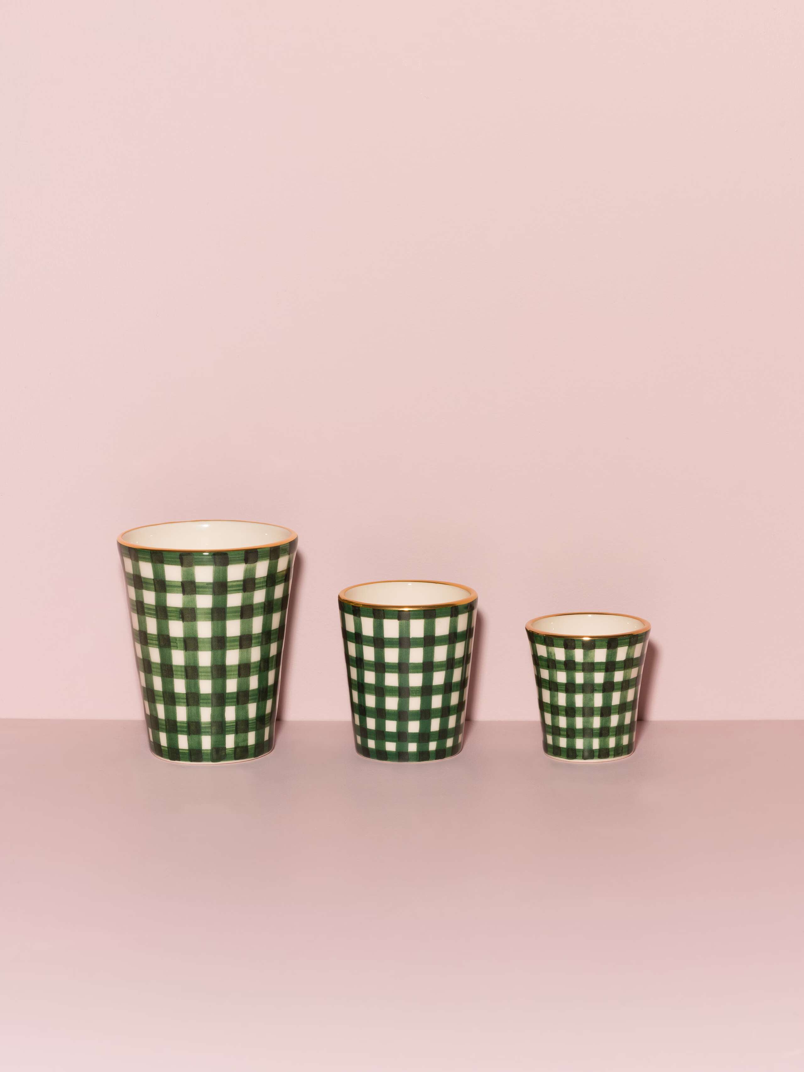 Picture of three beautiful handmade cups in three different sizes featuring a green vichy check pattern