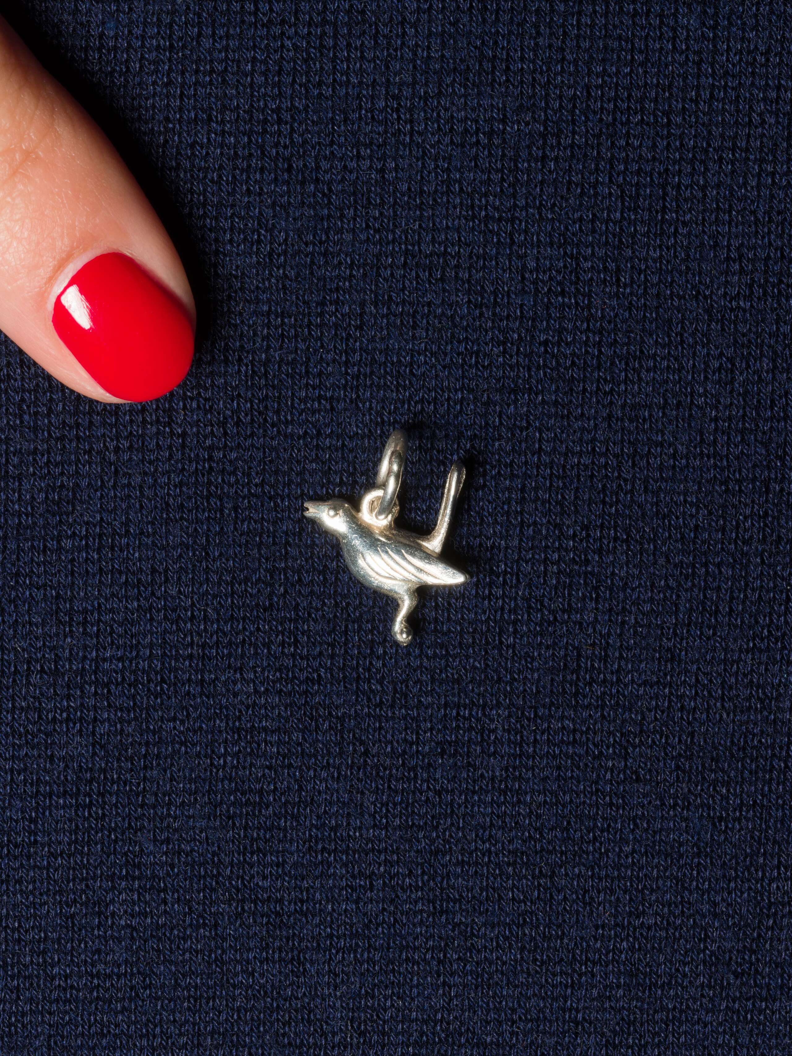 Picture of a bird pendant made of silver