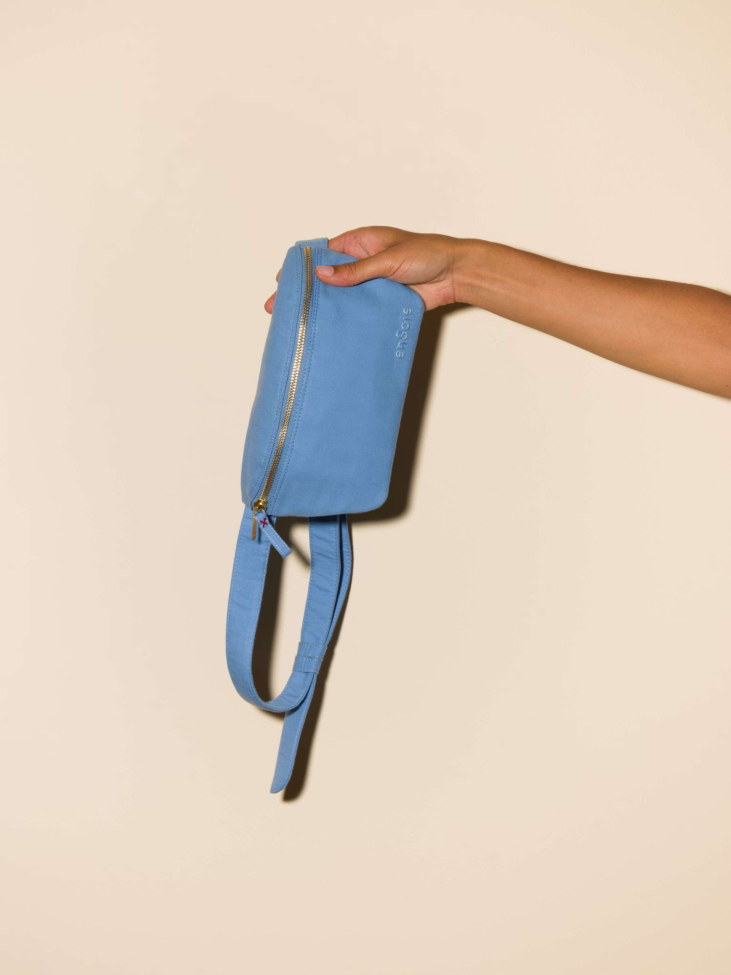 Picture of a light blue hip bag made of cotton 