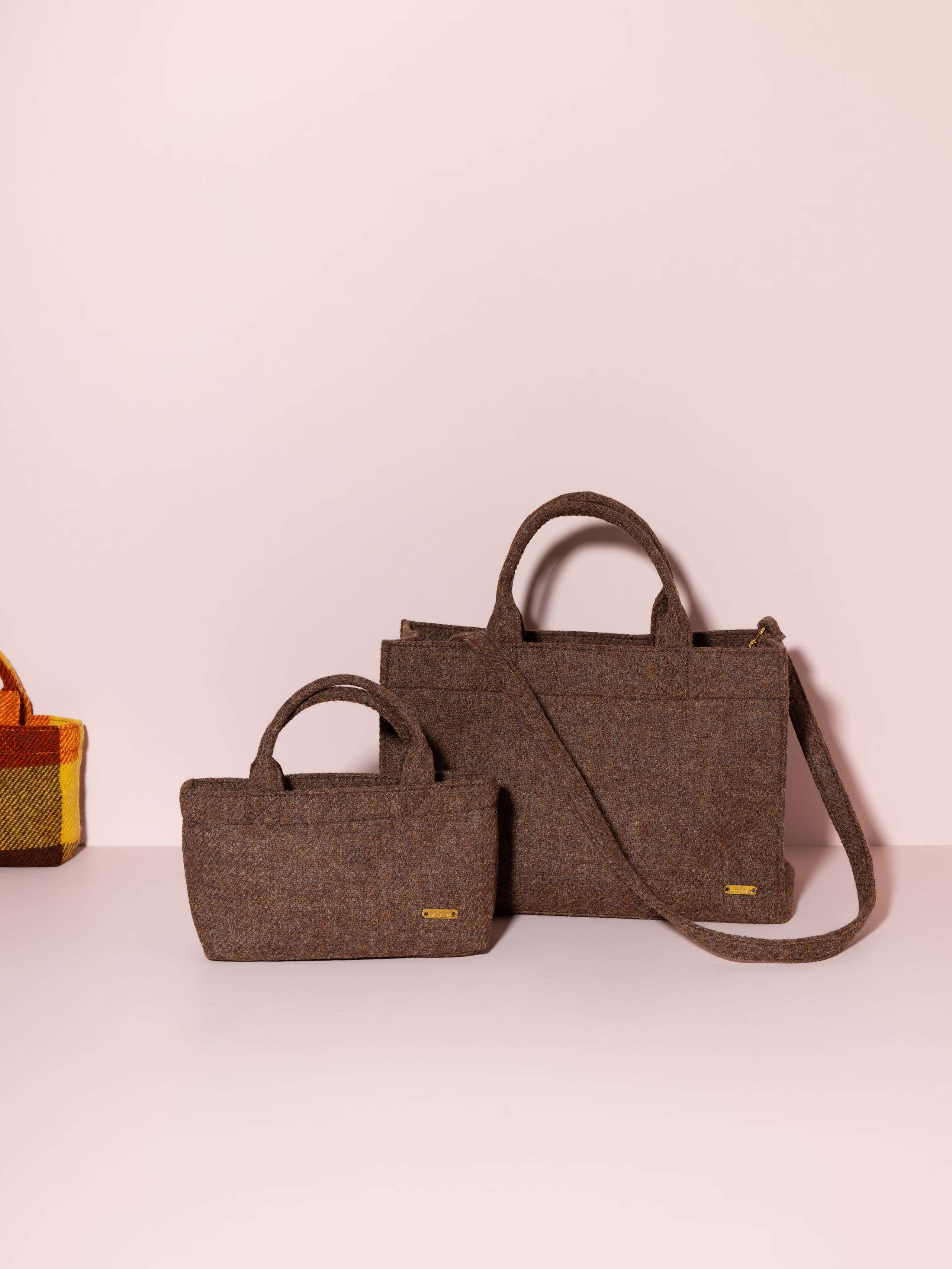 Picture of two handbags made of brown wool tweed 