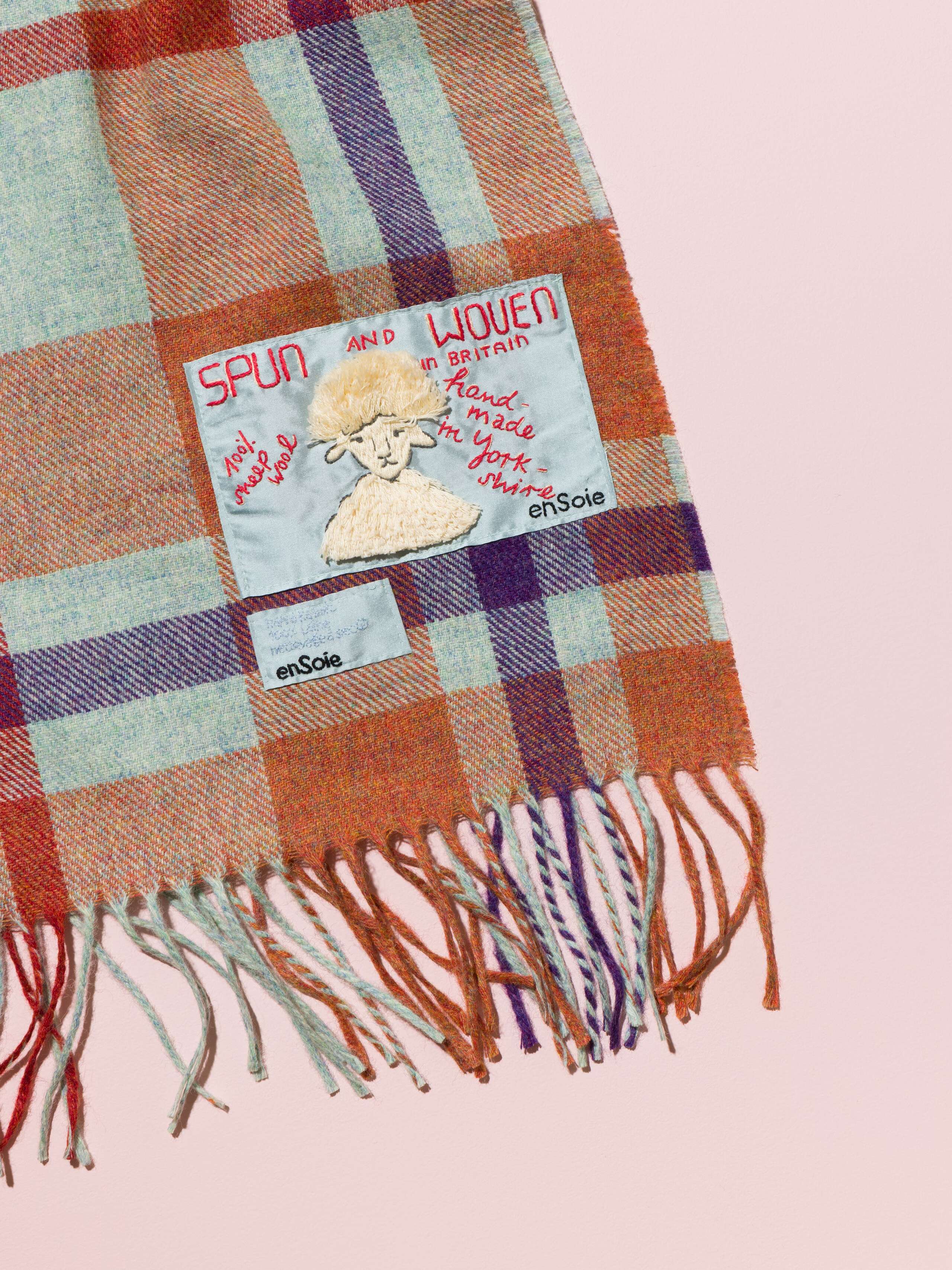 Picture of a detail of a coulourful handmade wool blanket 