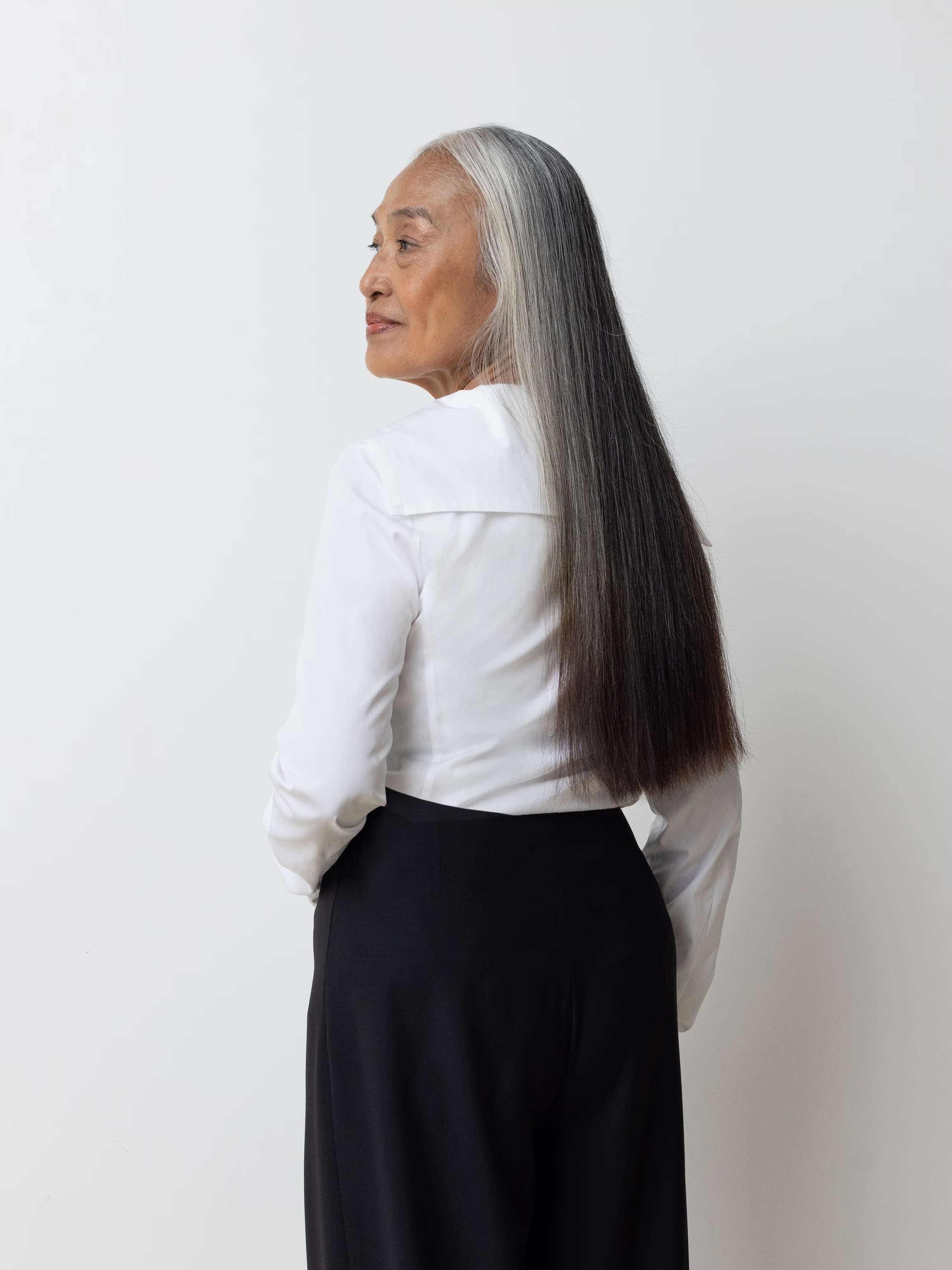 Picture of a model wearing a white cotton shirt