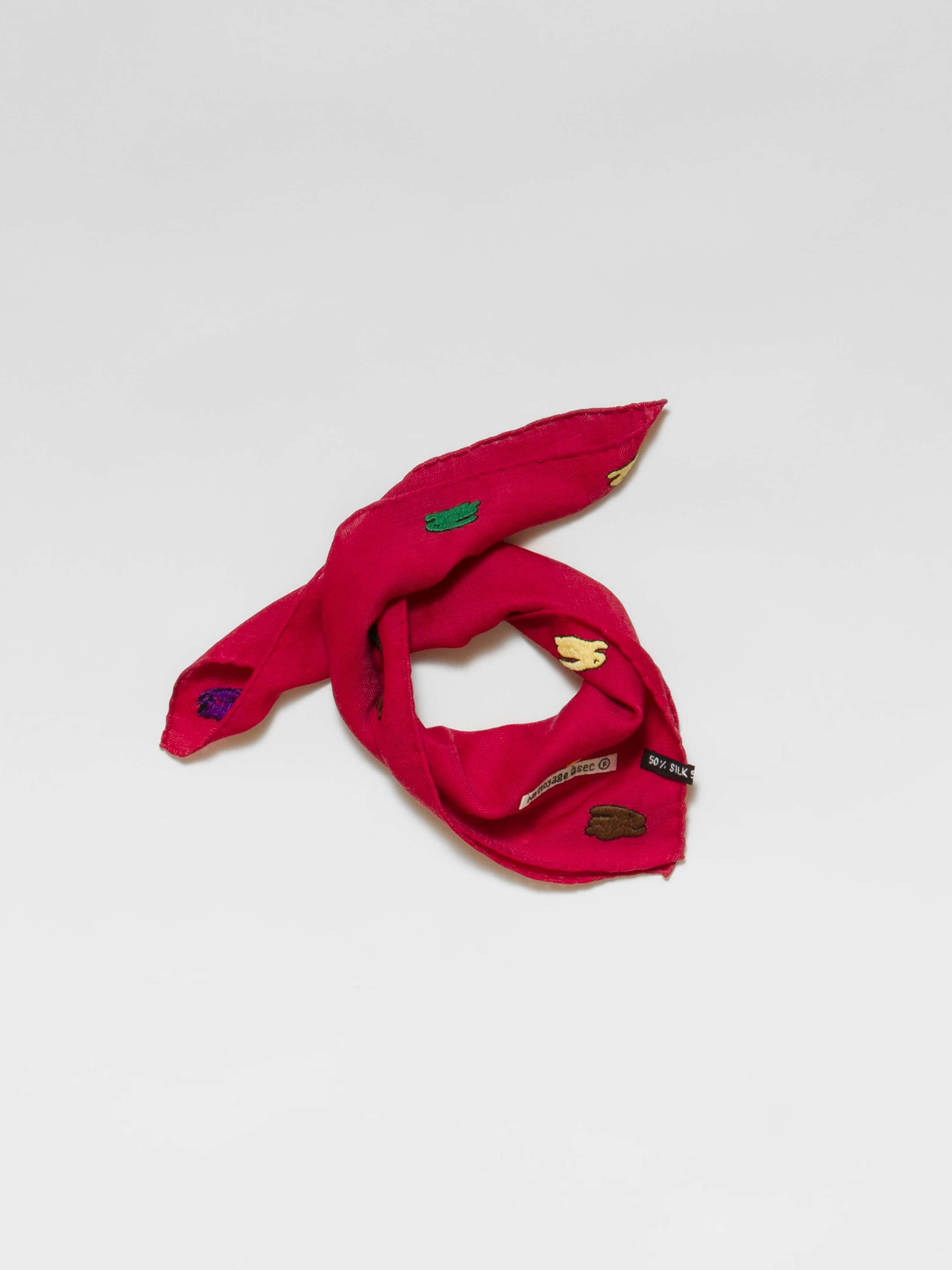 Picture of a red wool silk scarf featuring a cute rabbit embroidery