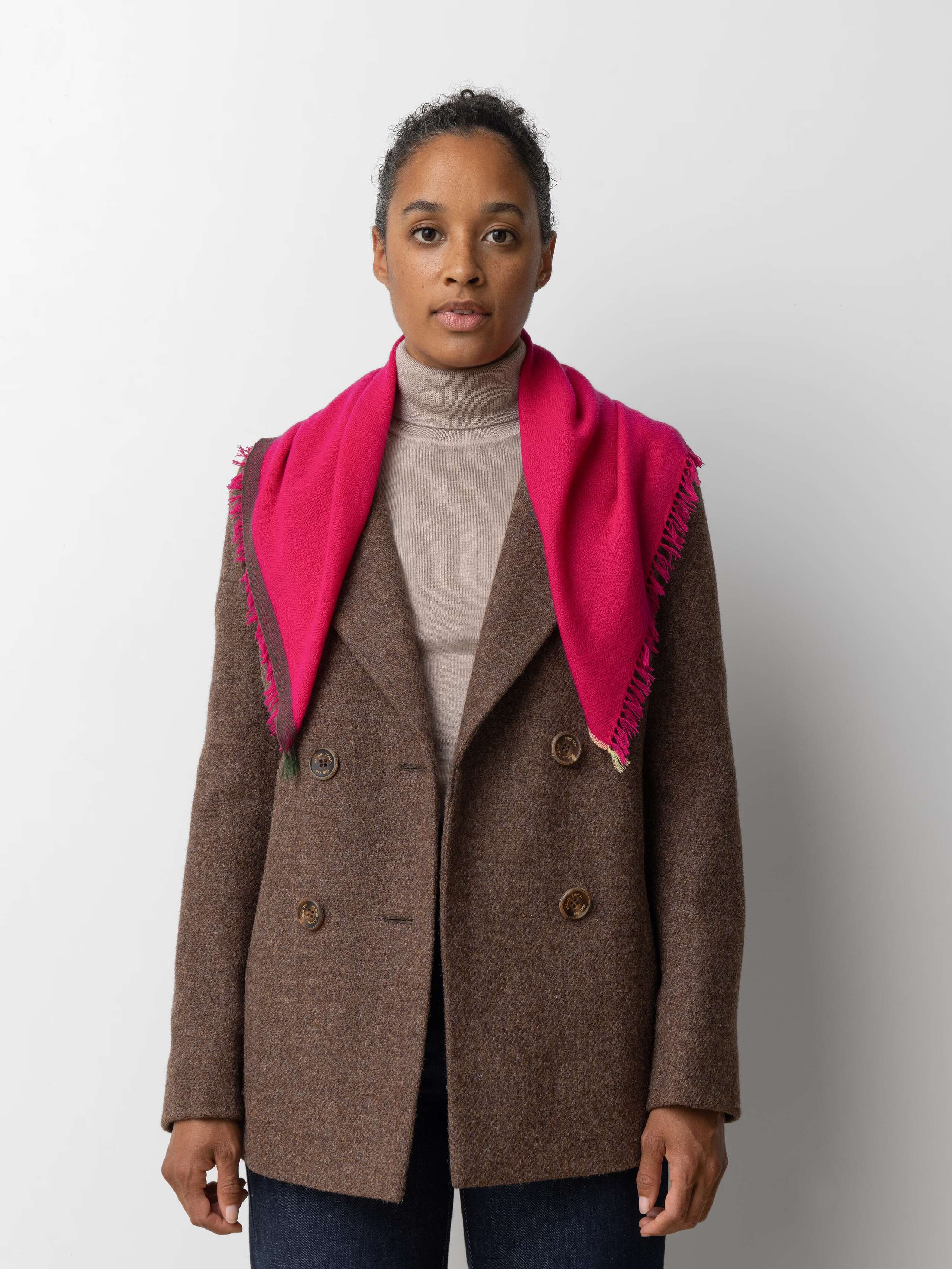 Model wearing Blia mini Cashmere stole in lovely berry pink