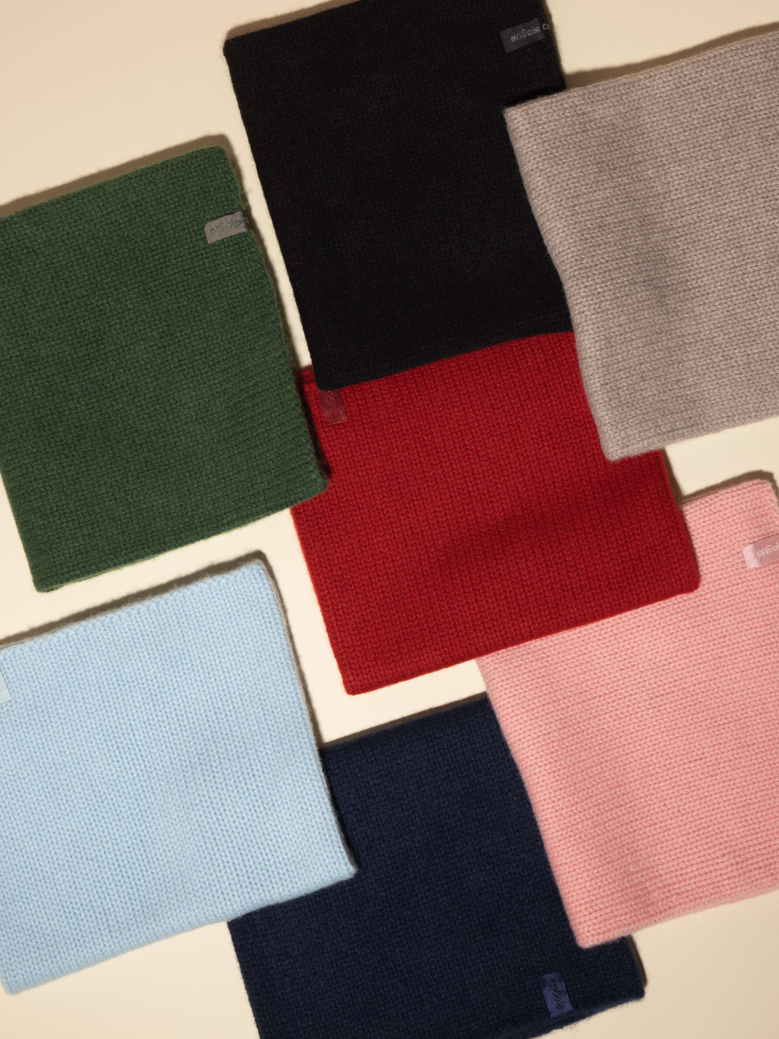 Picture of seven colourful cashmere tube hats made from high quality cashmere wool