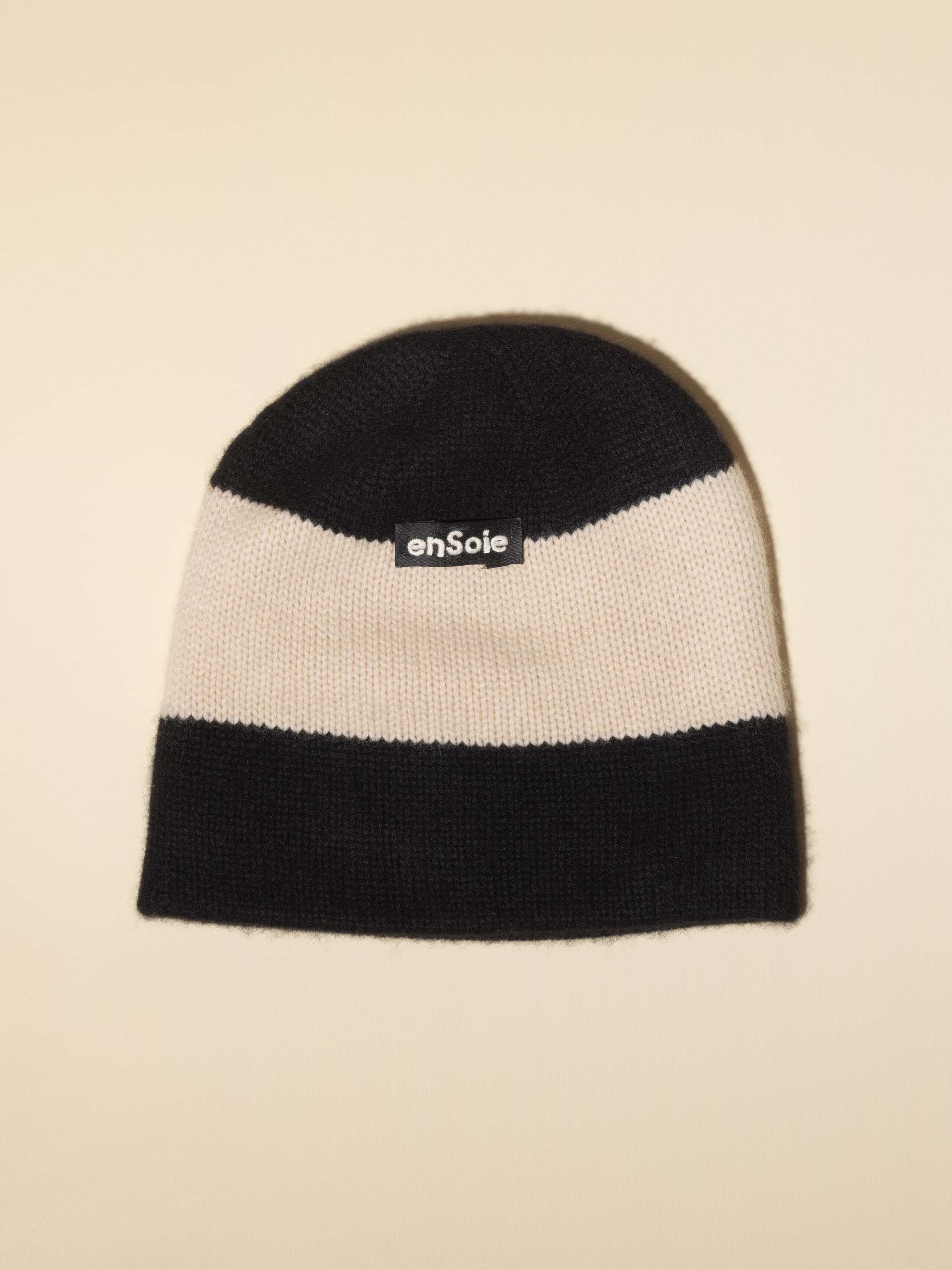 Picture of a black and white striped cashmere beanie