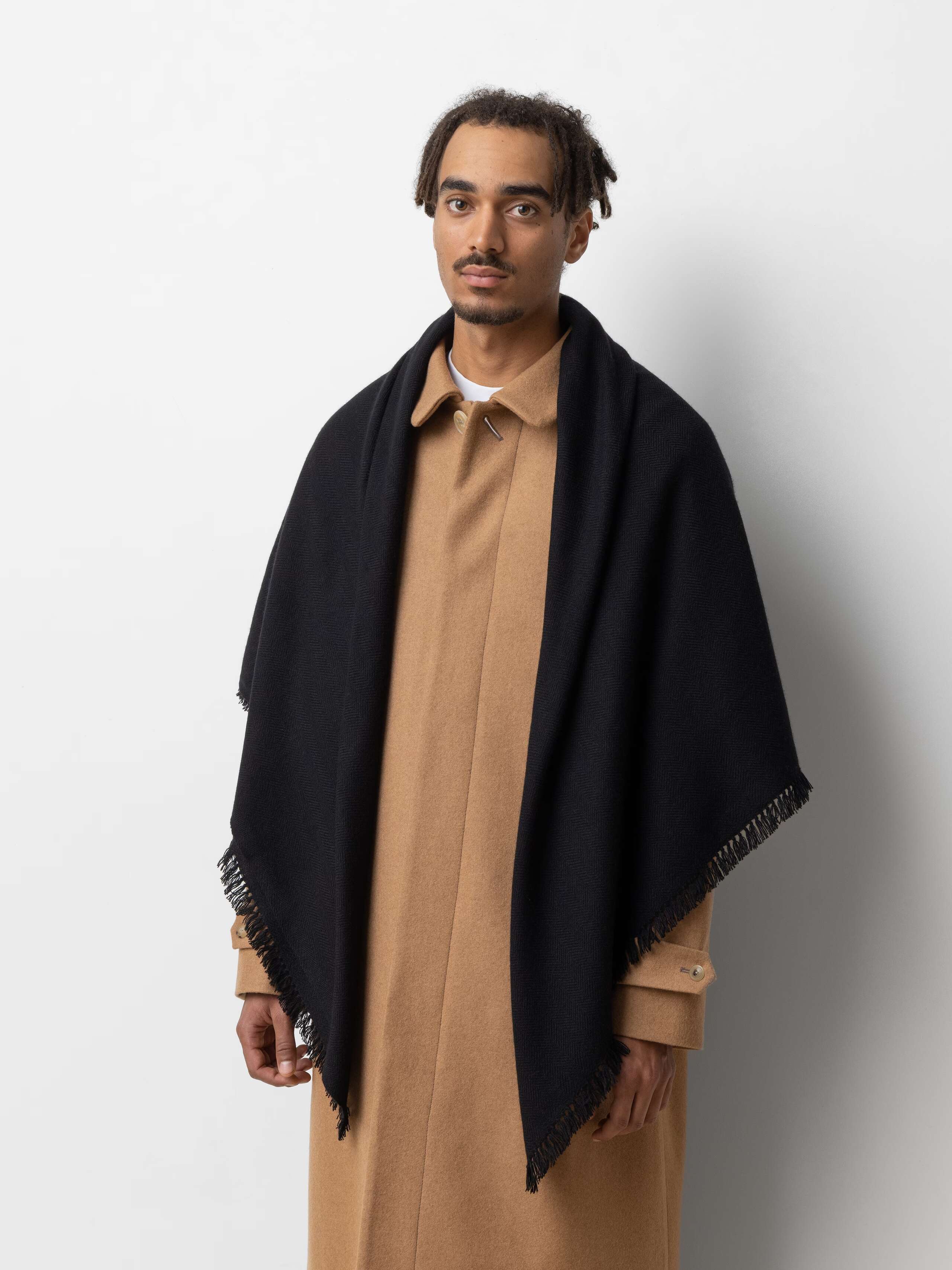 Picture of a male model wearing a black cashmere stole