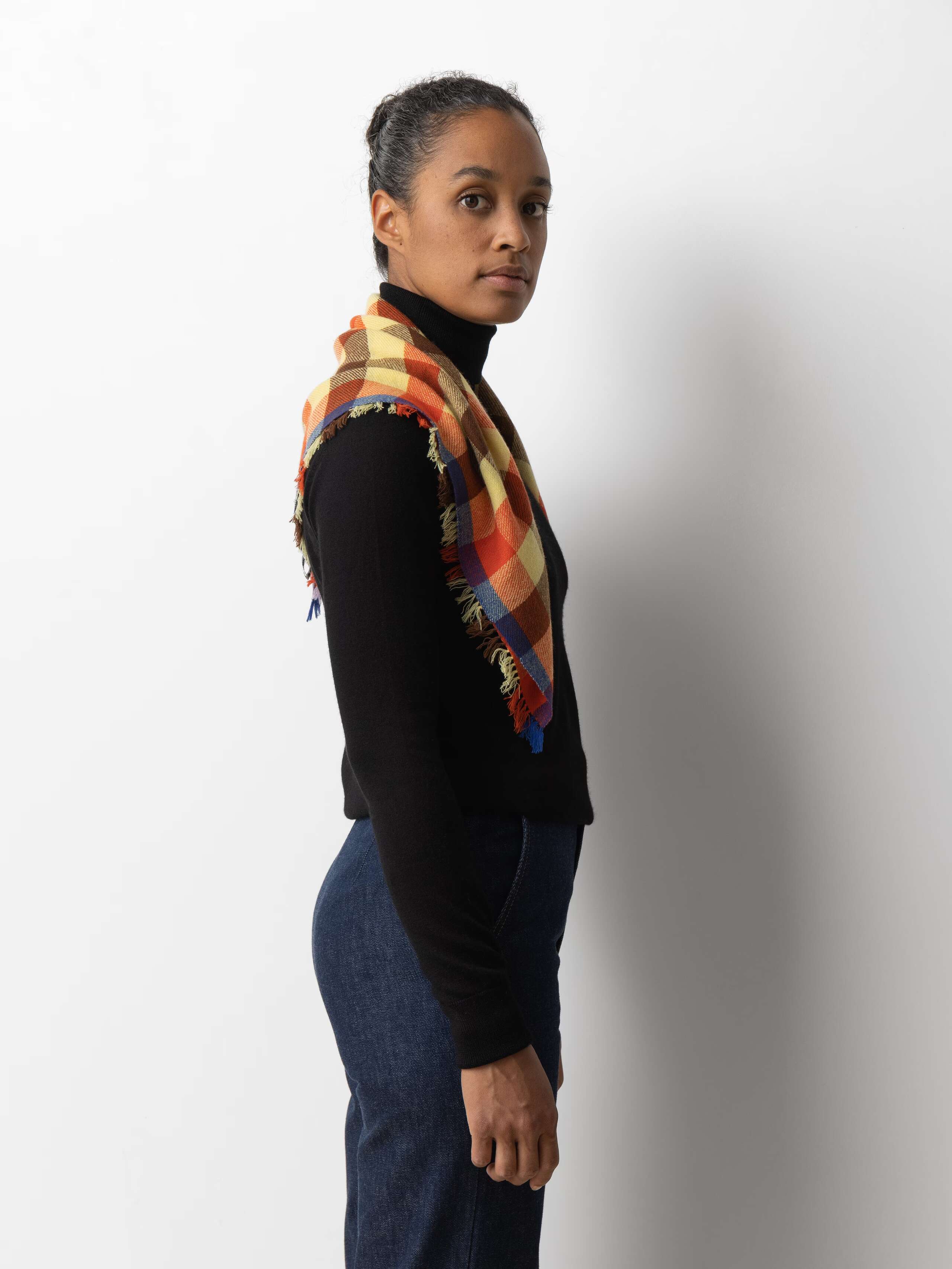 Model wearing Blia mini Cashmere stole in lucky lapin check multicolour