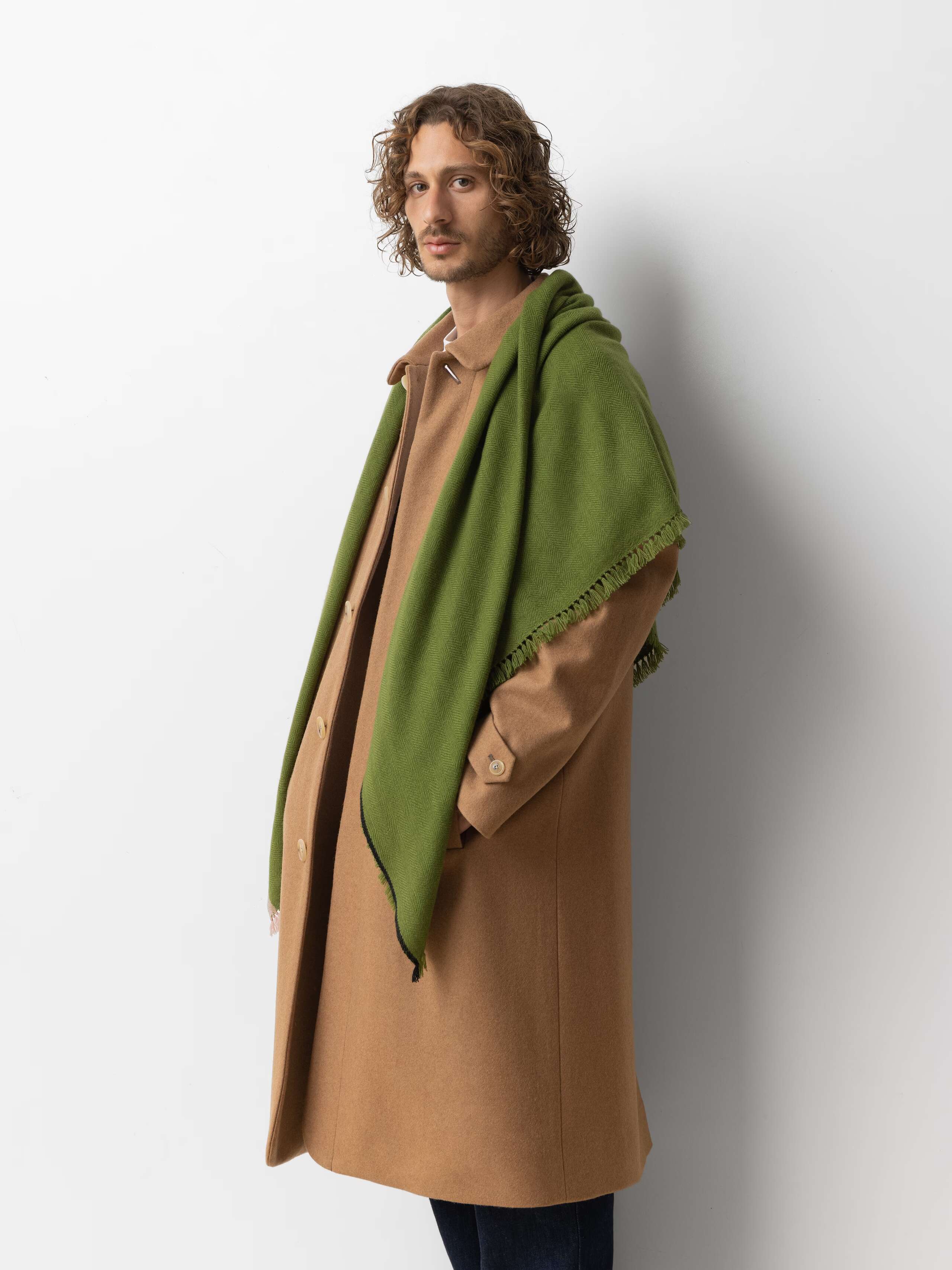 Picture of a male model wearing a green cashmere stole